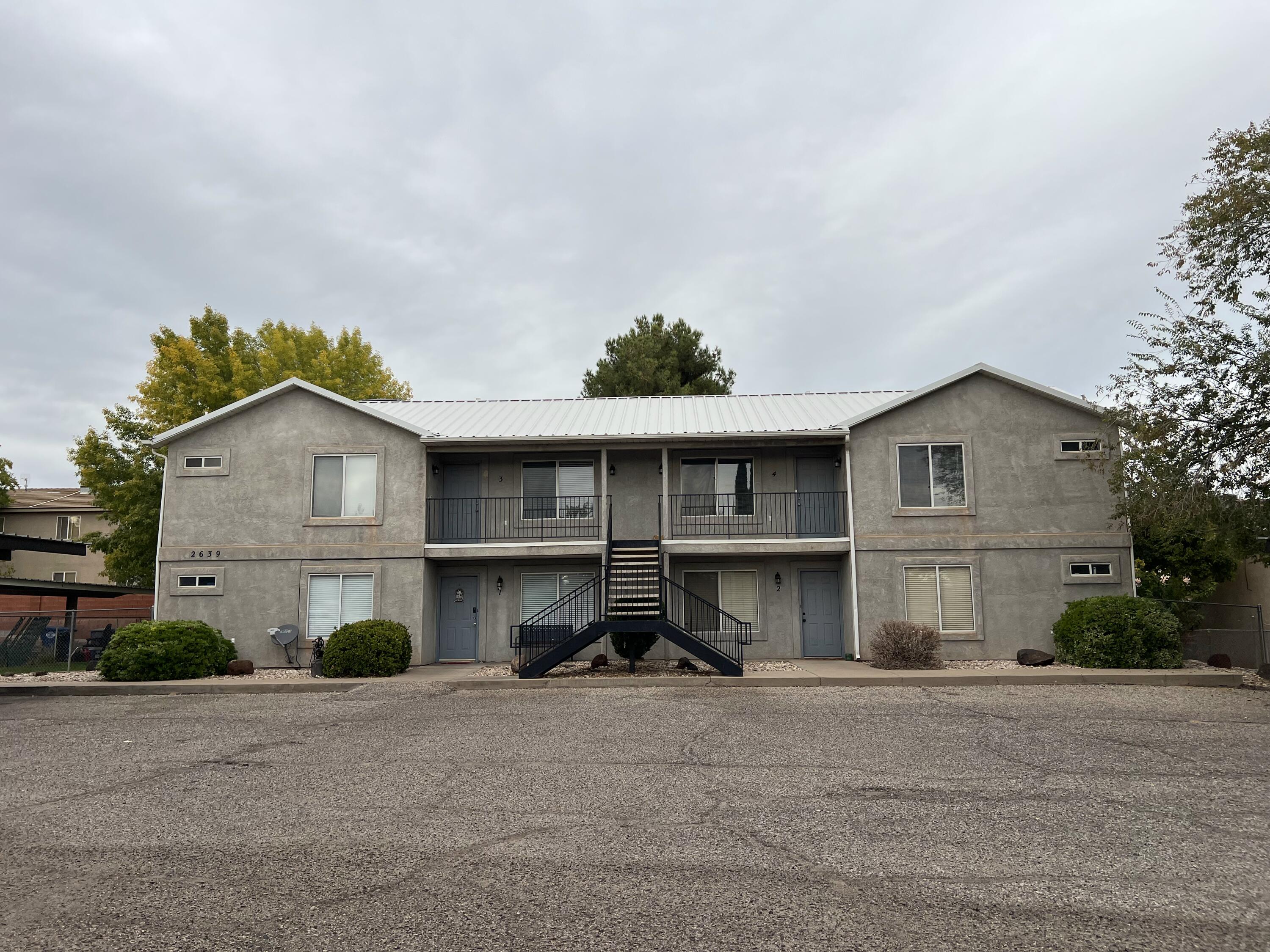 Rare 4 unit multifamily property in a prime location for a long-term investment. No HOA! Plenty of off street parking with 8 covered carport spaces and efficient 2 bedroom 1 bath floor plans with separate meters make this an ideal investment with low expenses. 2 of the units have been fully remodeled in the last few years and the roof was replaced with a metal roof this year. Please don't disturb tenants, buyer to verify all information. Owner/agent.