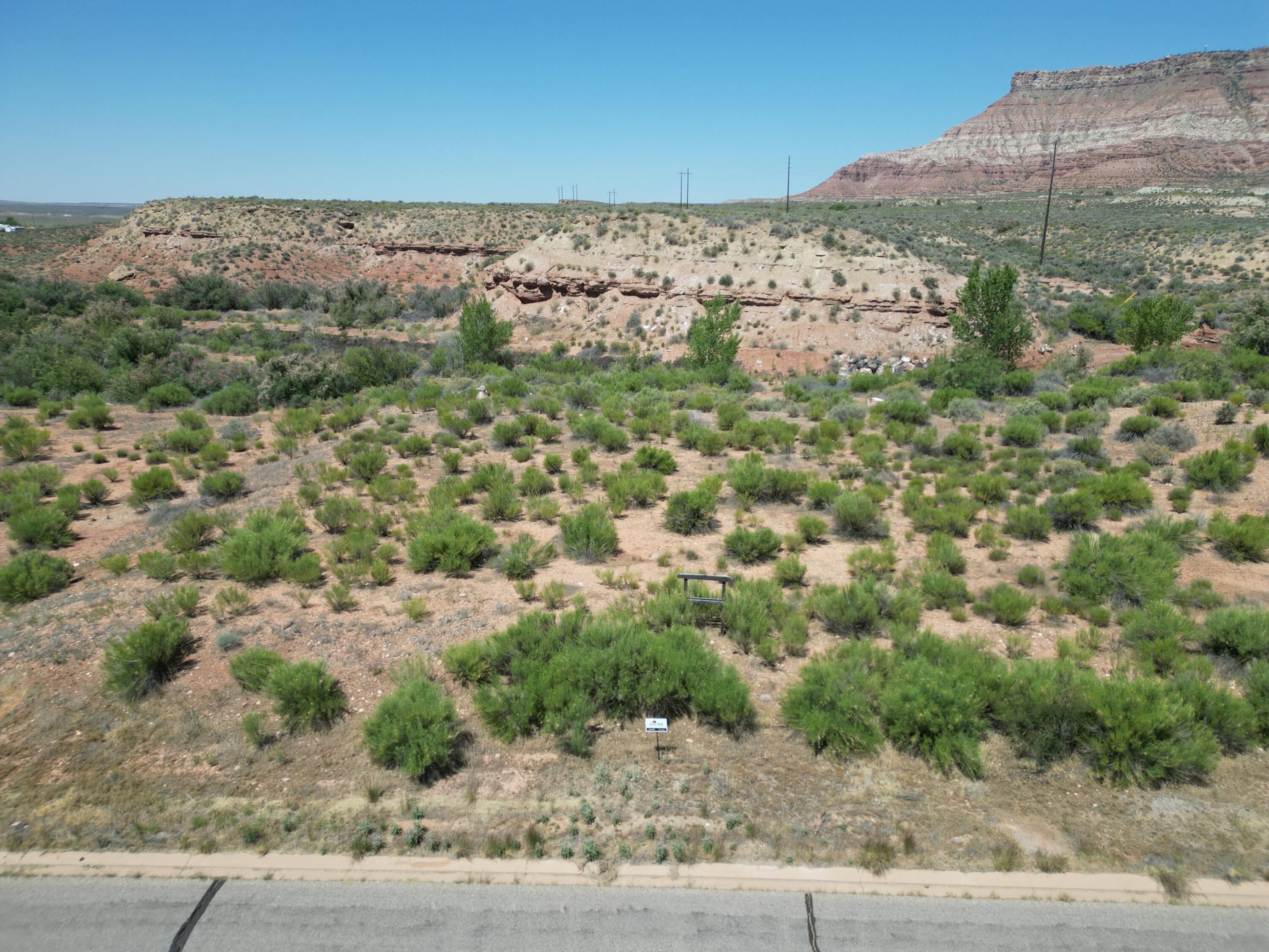 New Release - Phase 3 Premium 1+ Acre Lots Now Available!
Welcome to Sierra Bella in Virgin, Utah, where luxury rural living meets the breathtaking beauty of Southern Utah. Visit our brand-new sales office and discover an exceptional opportunity to own a fully improved estate-sized homesite just minutes from the entrance of Zion National Park.
These premium 1+ acre homesites offer spectacular panoramic views of Zion's iconic red rock mesas and provide the perfect setting for your custom dream home. 
Each Homesite Includes:
• One share of pressurized irrigation water
• Culinary water connection
• Fully improved lot
• Washington County Water Conservancy impact fees already paid
Prices Starting at $565,000
Sierra Bella offers a rare combination of privacy, natural beauty, and modern conveniences in one of Southern Utah's most desirable communities.
It is Nestled in the heart of the Zion Canyon region at approximately 3,600 feet in elevation, Virgin is renowned for its stunning landscapes, dark night skies, and unmatched access to outdoor recreation. Residents enjoy nearby hiking, biking, ATV trails, horseback riding, and endless opportunities to explore Southern Utah's spectacular scenery.
The area is known for:
• Sweeping views of Zion National Park and surrounding mesas
• Ranch properties and rich agricultural heritage
• Dark skies perfect for stargazing
• World-class outdoor recreation
• A peaceful rural lifestyle with convenient access to modern amenities
The surrounding landscape has served as the backdrop for numerous films, commercials, and outdoor recreation productions, showcasing the area's extraordinary natural beauty.
This location is one of Southern Utah's most scenic gateway communities while preserving its historic charm, rural character, and welcoming atmosphere.
Don't miss this limited opportunity to secure your place in Southern Utah paradise.
All information deemed reliable but not guaranteed. Buyer is responsible for independently verifying all info