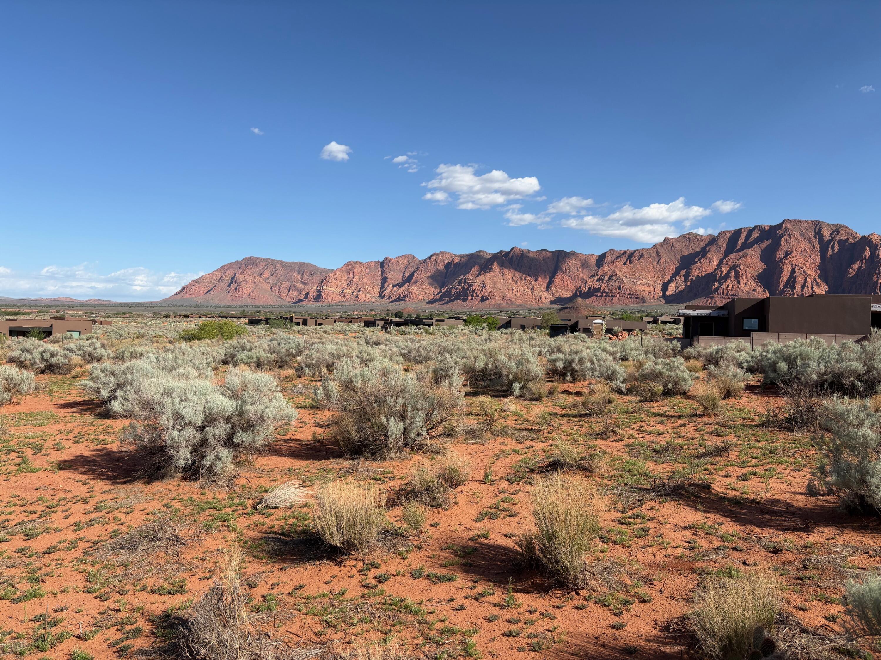 This stunning .67 acre cul-de-sac lot is situated in the newest phase of Kayenta. Offering up panoramic views of the area's picturesque red cliffs, desert sagebrush, and the Beaver Dam Mountains to the southwest. Build your custom dream home amidst the stunning natural desert beauty and enjoy jaw dropping sunsets, protected night skies, seclusion and tranquility...all within a 5 minute drive of the shopping, dining, and cultural and recreational offerings of the renowned Kayenta Art Village.