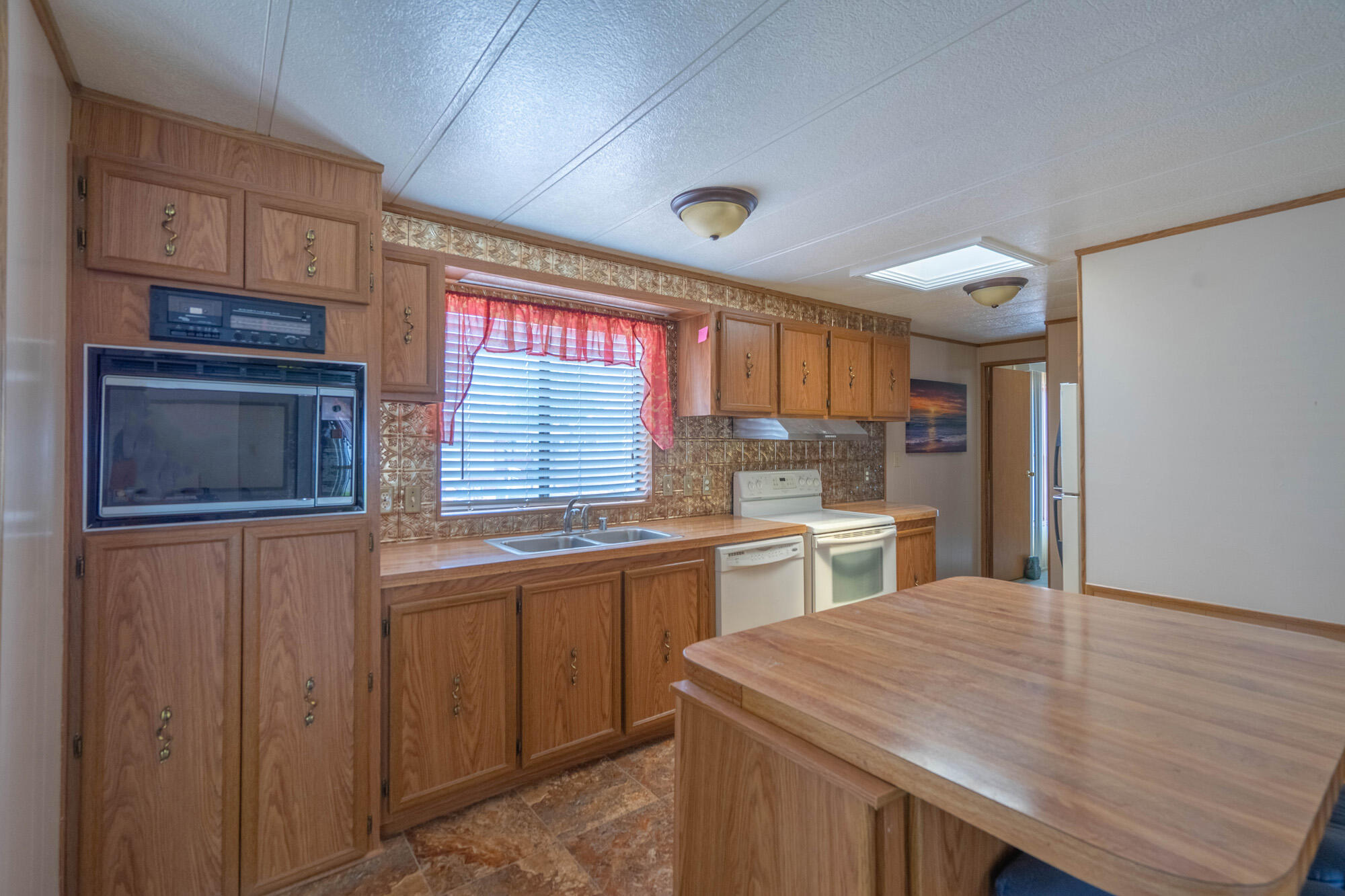 Welcome to Lava Bluff, a desirable 55+ community offering comfort, convenience, and an active lifestyle. This 2-bedroom, 2-bath modular home offers 1,084 square feet of functional living space with an open floor plan, abundant natural light, and easy single-level living.

The home features a spacious living area, comfortable bedrooms, and a private primary suite, providing a great opportunity for a buyer to make it their own. Located within a well-established community, residents enjoy access to amenities that include a clubhouse, swimming pool, social activities, and beautifully maintained common areas.

Conveniently situated near shopping, restaurants, medical facilities, grocery stores, golf courses, and other everyday conveniences, this property offers easy access to everything you need while maintaining a peaceful neighborhood setting.

Whether you're looking for a full-time residence, seasonal retreat, or investment opportunity, this property offers excellent potential in a sought-after Southern Utah location. Property is being sold as-is.