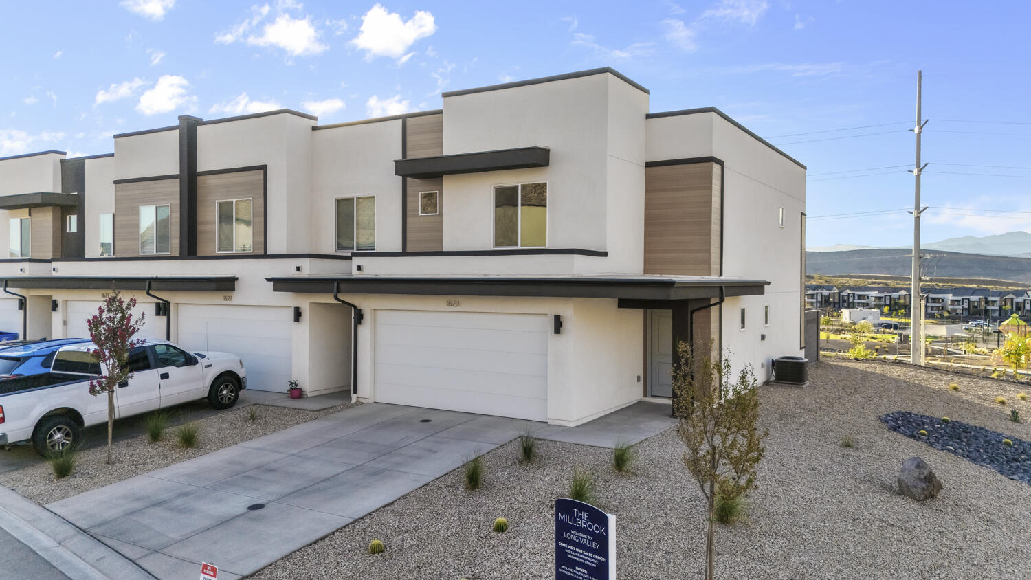 Welcome to the Millbrook with the ''Modern Exterior'' in desirable Long Valley! This thoughtfully laid out floor plan has 3 bedrooms, 2.5 baths, and a 2-car garage. Long Valley features amazing amenities that include swimming pools, hot tub, pickleball courts, playground, movie lawn, terra-park, trails, and so much more! The home is equipped with smart home technology, is on Dixie Power, and is energy efficient, adding even more value to your purchase! Pictures are of a model of similar floor plan, actual finishes, upgrades, or elevation may vary. Square footage is provided as a courtesy.