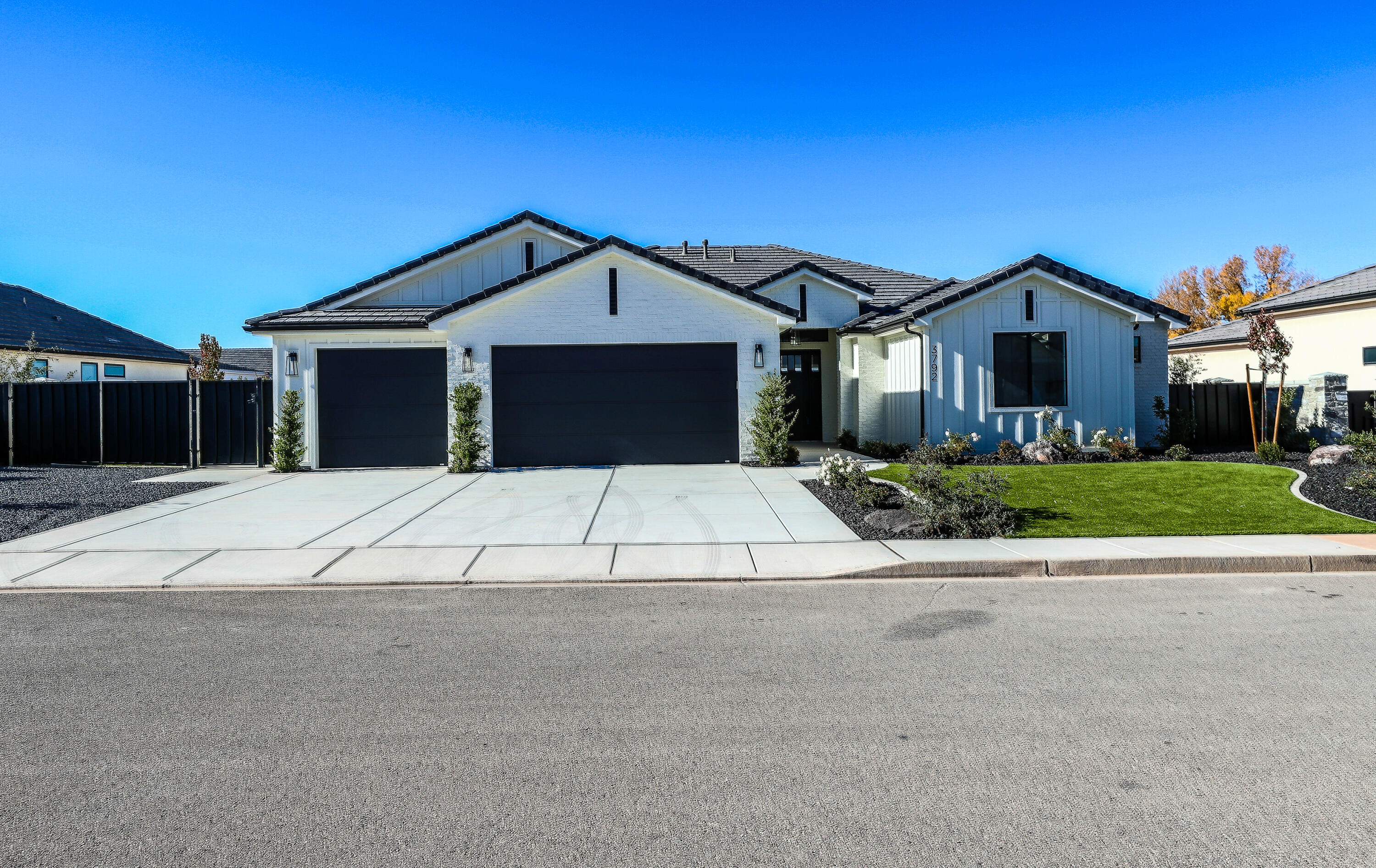 Discover this stunning, new custom home in a highly sought-after neighborhood, offering a perfect blend of style, comfort, and convenience. Set in a great location, this property features beautiful upgrades throughout, from refined finishes to thoughtful design details that elevate every room. Enjoy a low-maintenance, low-water yard that keeps outdoor living simple and appealing year-round. The spacious 3-car garage includes an upgraded epoxy floor, providing durability and a polished look. With the added benefit of Dixie Power for lower utility costs, this home delivers exceptional value. Move-in ready and meticulously cared for, it's an ideal choice for anyone seeking quality craftsmanship and modern living in a fantastic community.