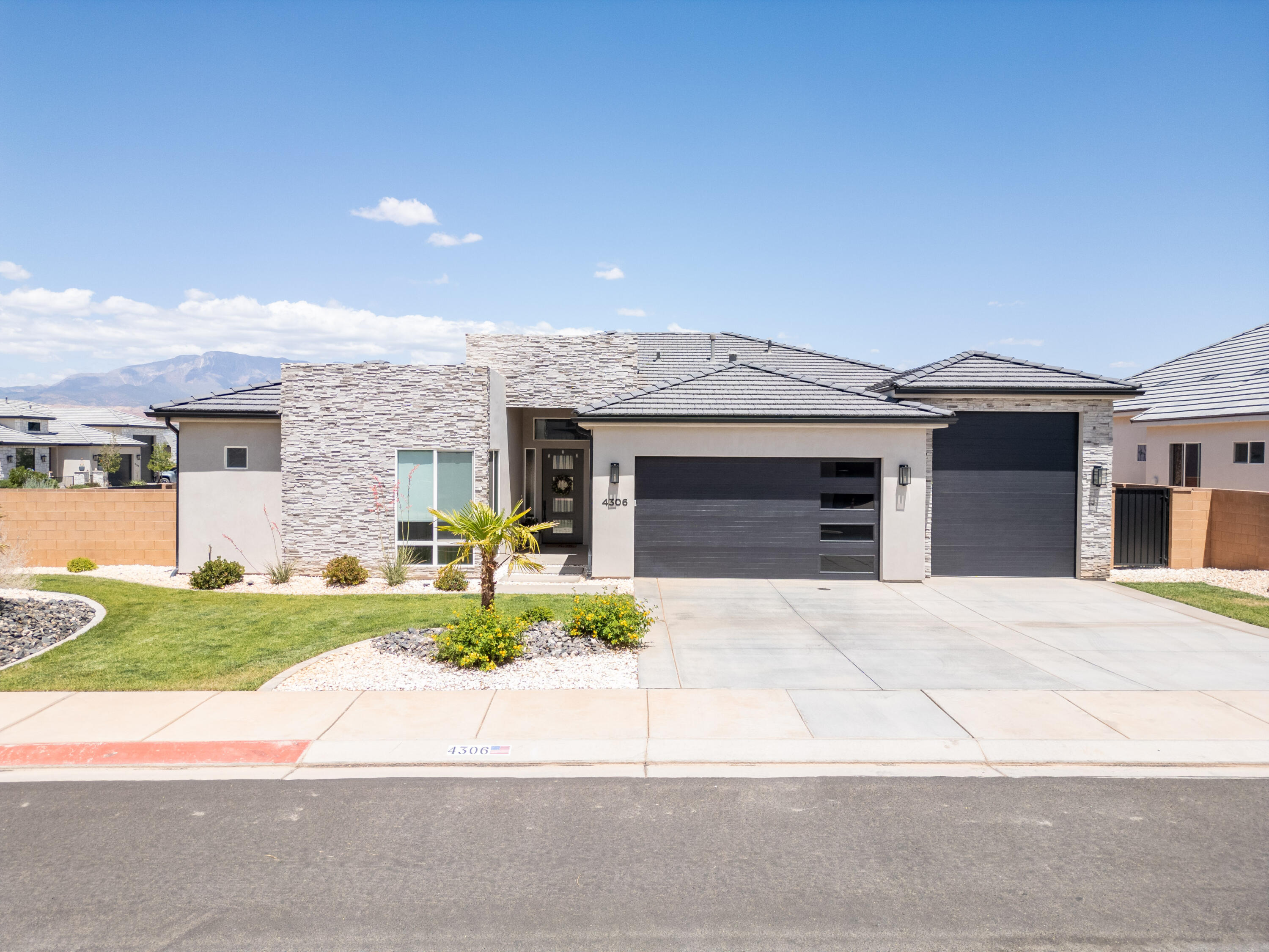 Custom home this stunning modern, open-concept home that is great for entertaining and views of Pine Mountain. This home features 4 bedrooms and a den, 3.5 bathroom, fireplace, a 2 car garage plus a 31 ft boat garage with AC and Heating in the garage, water softener, a Pool with a relaxing Jacuzzi, and grassy yard to enjoy. Elongated north facing windows that allow ample sunlight all day and views of the mountains. Enjoy outdoor recreation that is close to Sand Hollow Reservoir, sand dunes, shopping, Zions National Park, and more. No HOA and Dixie Power. 
Call for a showing today.