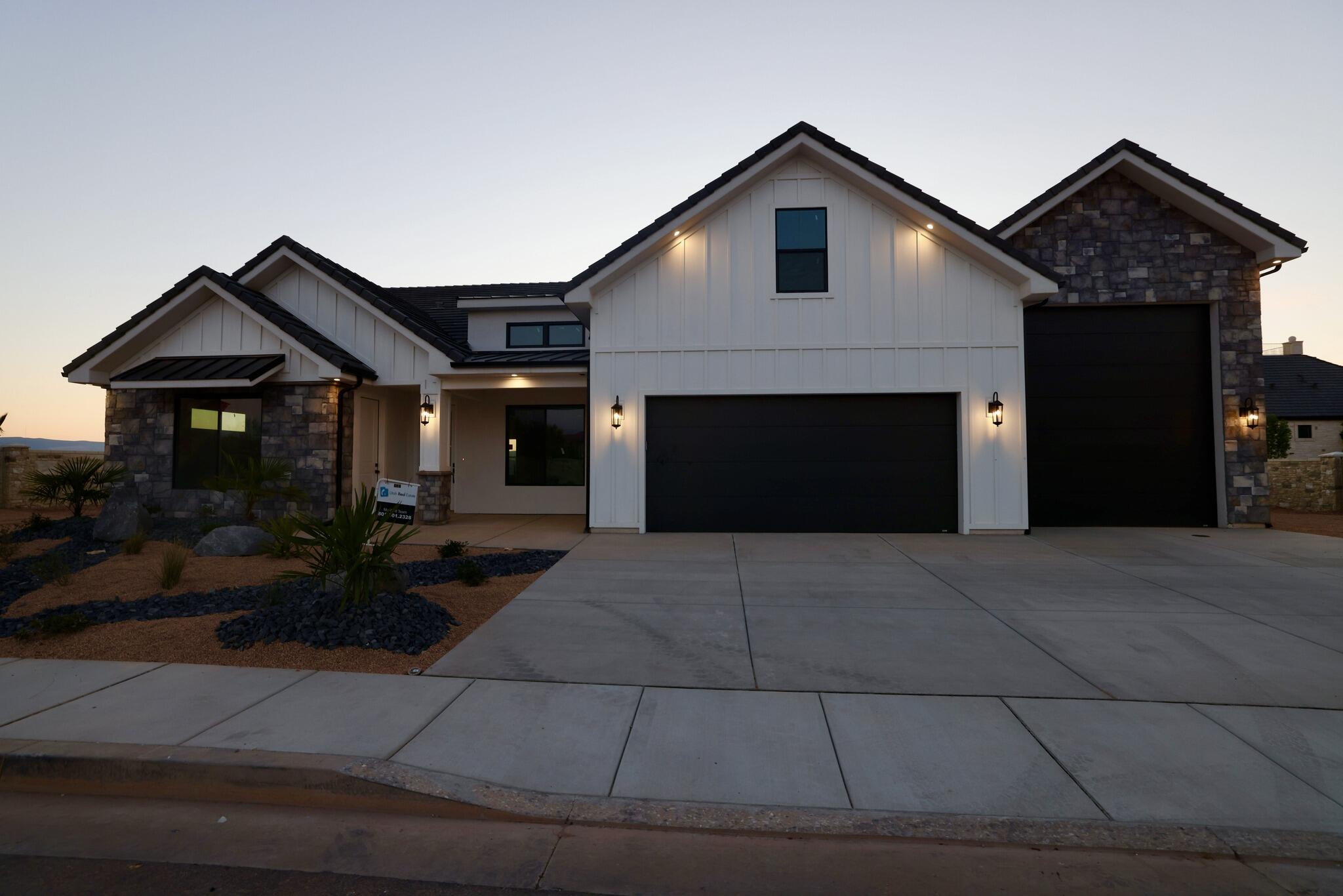 Hawkeye Point is close to EVERYTHING! Just minutes from Downtown St. George and Tuacahn to the west and Sand Hollow sand
dunes to the east. perfectly located in the middle of it all. Whether it's hiking, biking, water and off-road recreation, theater, or simply peaceful scenic walks,
there is something for everyone. Our modern floor plans with RV garages are perfect for the on-the-go lifestyle. Our standards include interior insulated
walls., Pella sliders, upscale kitchens, open layouts, with ample room for entertaining and a sophisticated owners suite with spa-inspired bathroom. This
home features a casita, and The RV Garage is 16x57 and the door is 12x14' high