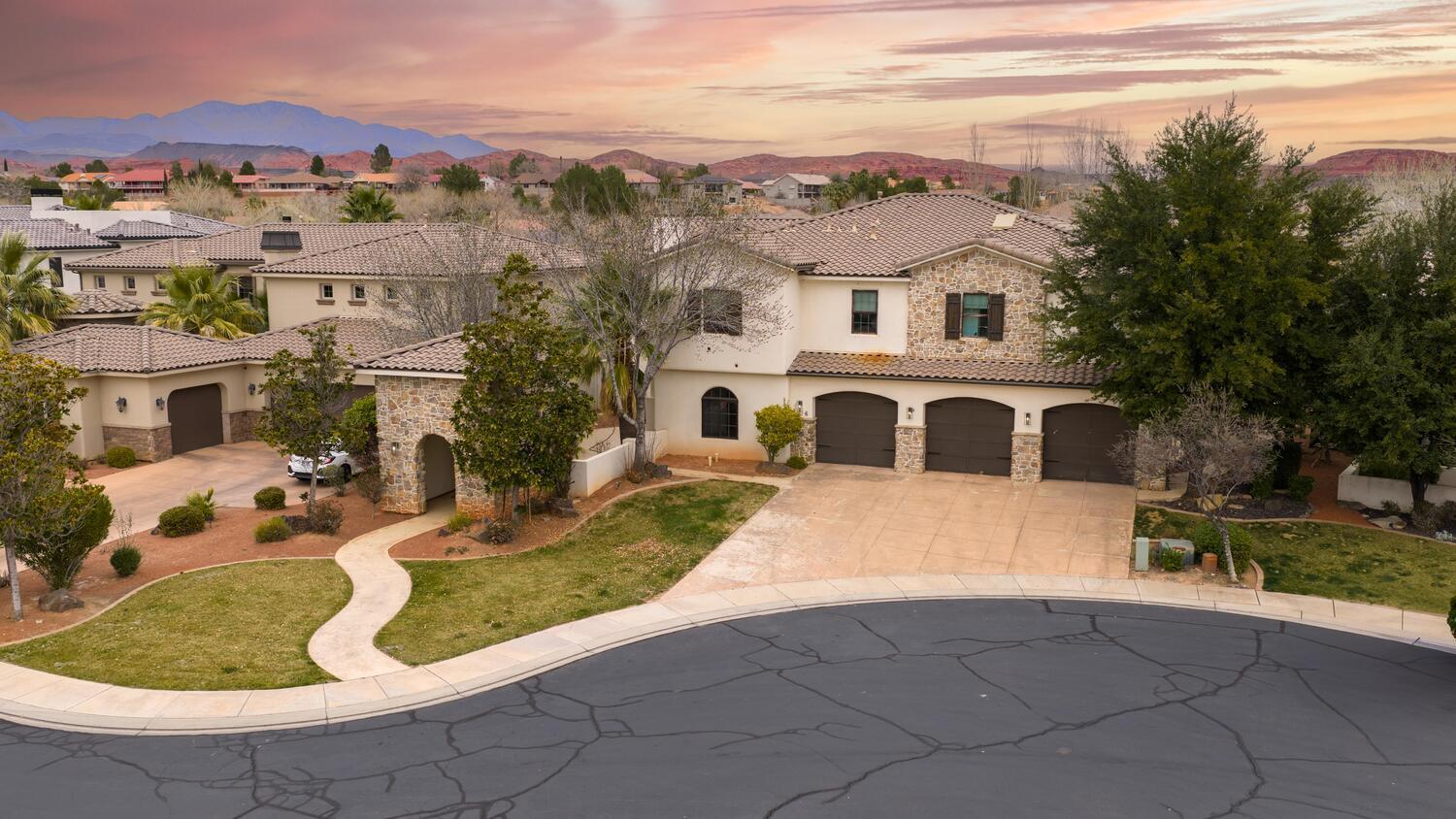 Nestled in one of Santa Clara's desirable luxury enclaves, this remarkable residence blends timeless design with modern luxury across nearly 7,000 sf of inspired living space. The Villa Bonita gated 12 estate community boasts an exclusive park complete with Pickle Ball Court. Whether cozy morning cocoa or casual evening sunsets, the outdoor living spaces upstairs & down, private pool, sauna & outdoor shower extend the homes comfort into the fresh Santa Clara air. Built in 2007 & thoughtfully crafted for both grand entertaining and everyday comfort. This home offers a rare combination of scale, quality & refined finishes. From the hand scraped wooden floors to the custom rock architectural columns & multiple Juliet balconies, you will be swept away by the sophisticated romance of this home. HOA dues include landscaping water for the entire community for the public areas, park and residence's yards.