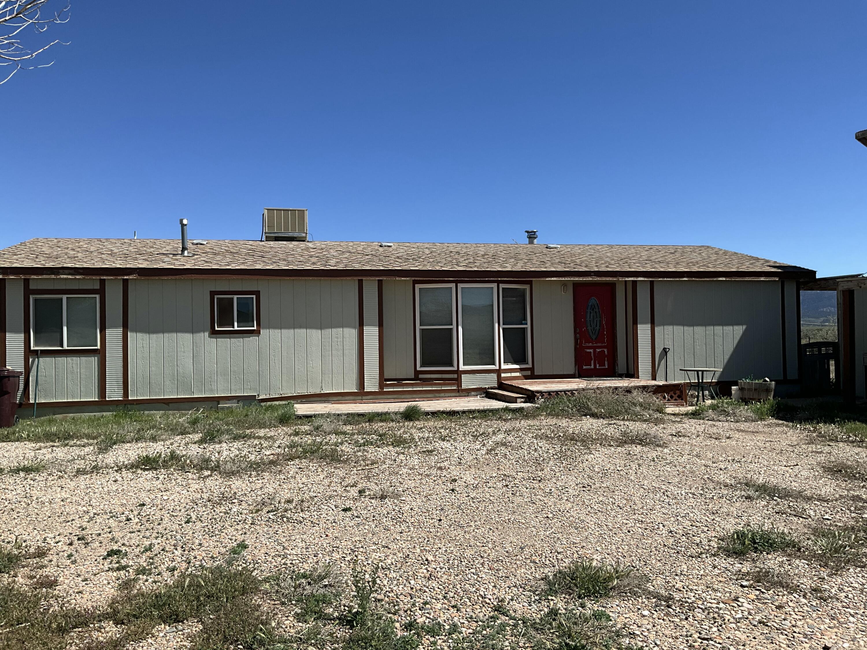 This exceptional property offers the perfect blend of peaceful country living on the outskirts of town while still enjoying the convenience of nearby city amenities. Located in the up-and-coming area of Meadows Valley Ranch, this 19+ acre property, with water and power, presents endless possibilities for those seeking ample space, privacy, and opportunity.

Enjoy breathtaking mountain views and the chance to create your own small farm or private retreat, the list goes on..A new fire station nearby adds peace of mind and value to this growing community, while a short drive brings you to shopping, dining, schools, and everyday city amenities.

With acreage, views, bonus shop/apartment(about 75% complete)and incredible future potential, this property is a rare opportunity to own in one of the area's promising locations.