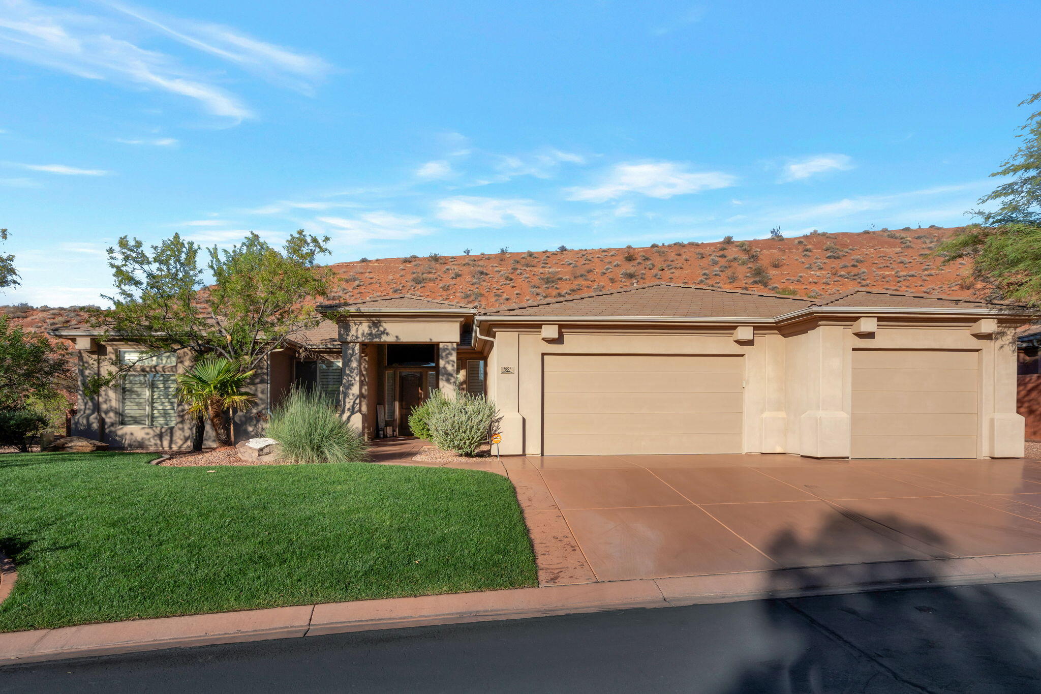 Great Home! Nestled at the foot off Red Cliffs. Close to the Famous Tuacahn Theater, Hiking Trails Nearby. HOA Amenities include: Clubhouse: Large Gathering Area, kitchen, indoor pool, hot tub, fitness center, 2 outdoor pools, green space, front yard maintenance. Second home for sellers, MOST FURNITURE CAN BE PURCHASED.