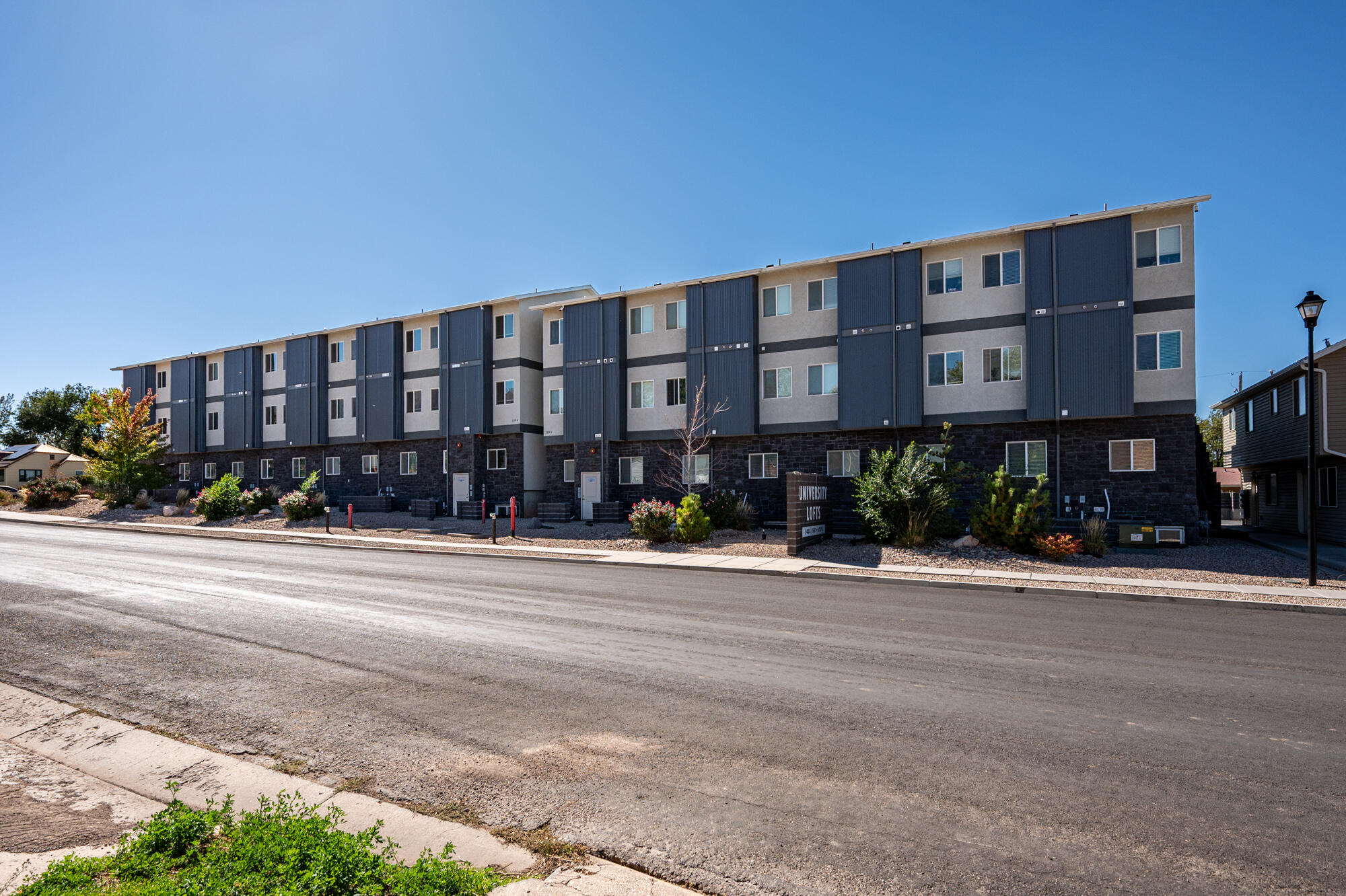 University Lofts - Building B - Prime Student Housing Investment | 52-bd Apartment Complex. Exceptional opportunity to own University Lofts Building B a 7-unit 52-bedroom/52-bathroom apartment complex purpose-built for premium student housing just one block from Southern Utah University. This property is 100% occupied, providing immediate cash flow for investors seeking a stable and profitable asset in a thriving rental market. Constructed with quality and longevity in mind, the building features 5/8'' drywall for added fire resistance, sound privacy, and durability, acoustically insulated interior walls & solid core interior doors throughout creating a quiet and comfortable environment highly valued by tenants. Located in one of Southern Utah's most desirable rental locations. Included in the sale, is a portion of the parking lot on 900 W. (Building A is also available, under separate ownership, providing the rare opportunity to acquire both buildings and own the entire University Lofts complex a premier student housing package with exceptional performance and future potential.)