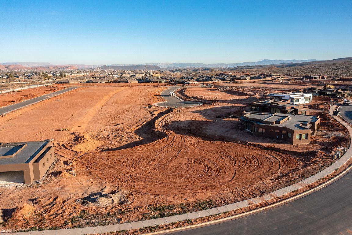 Build your dream home in one of Ivins' most desirable communities. This pad-ready lot in Indigo Trails offers stunning, unobstructed views of Red Mountain, Snow Canyon, & Pine Valley Mountain — the ultimate backdrop for a custom home designed to reflect your vision & lifestyle. Enjoy close proximity to the World Class Black Desert Resort, Kayenta Art Village, Snow Canyon State Park, Anasazi Ridge Petroglyphs, Fire Lake Park, & Tuacahn Amphitheatre, all just minutes away, blending luxury, adventure, & restoration into daily life. With an Indigo Trails Approved Builder in place, your path to building is streamlined & secure. Start planning your dream home today — this lot is ready when you are. Lot & Construction financing options available! Ask agent for details. Schedule a site visit to experience these views in person. Opportunities like this don't last  inquire now before it's gone.