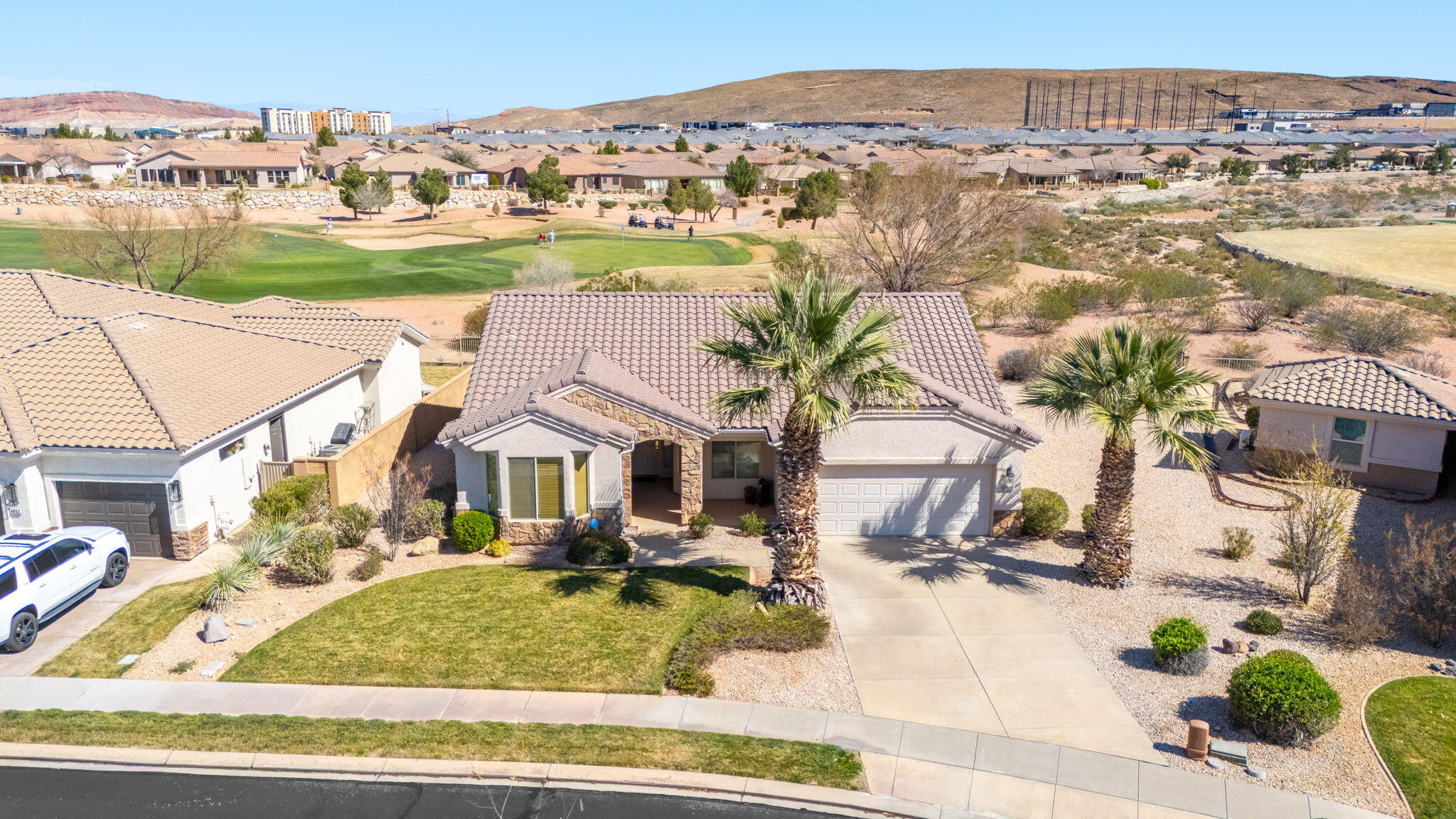 This charming 3-bedroom, 2-bathroom home with a 2-car garage sits on the edge of a beautifully maintained golf course in a welcoming 55+ community. Enjoy prime mountain views from your backyard.
The east-facing backyard offers shaded afternoons and pleasant evenings--perfect for relaxing outdoors and soaking in the peaceful surroundings without the intense western sun.
Conveniently located with quick access to the new Costco and Smith's Grocery, daily errands are effortless, while the community's low-maintenance lifestyle lets you focus on leisure, golf, and the active adult amenities nearby. Taxes reflect non-primary residence. 45% County discount is applied when home is used as a primary residence. https://www.washco.utah.gov/departments/assessor/residential-exemption/