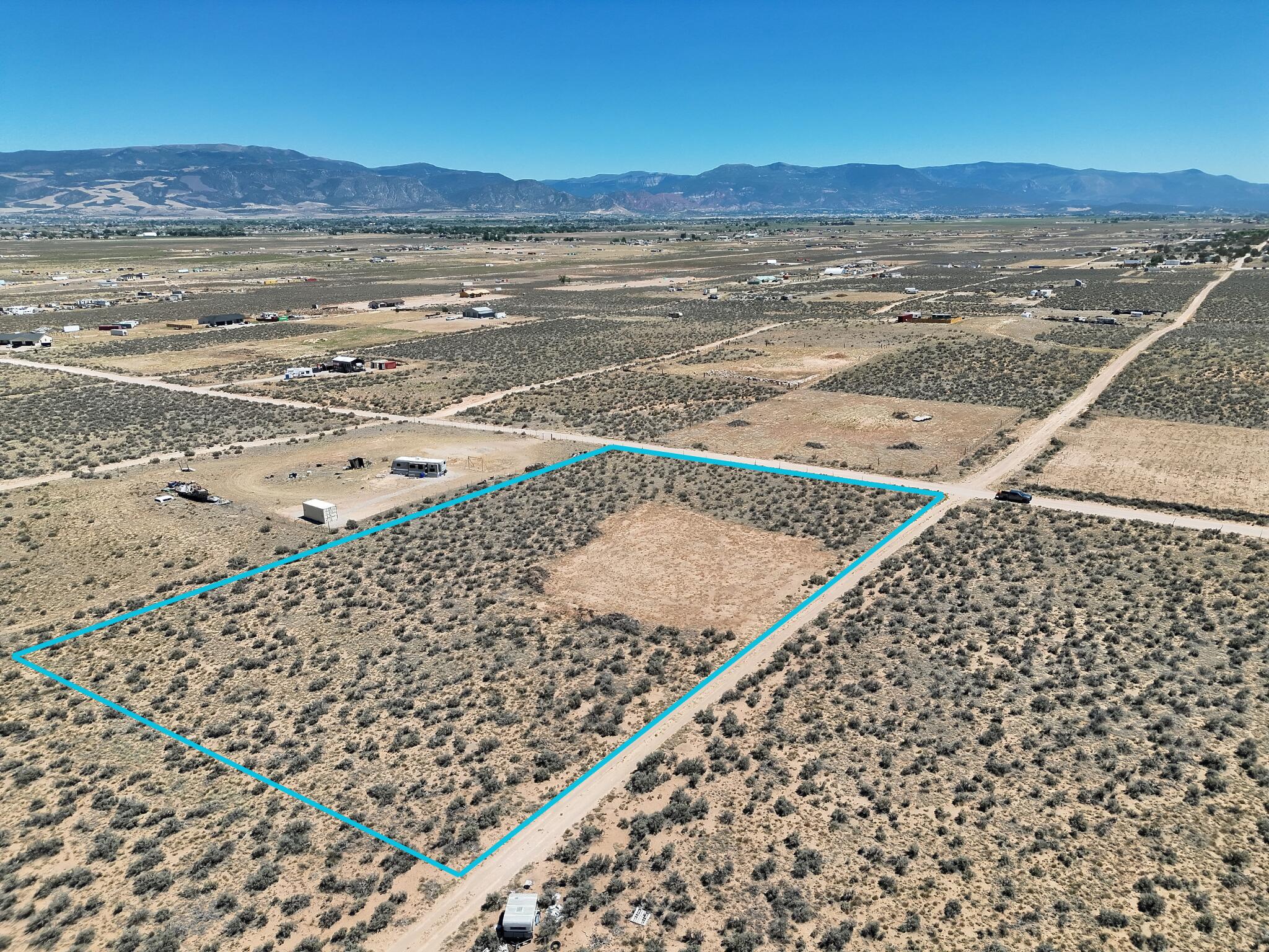 The perfect lot for off-grid living, with 2.50 acres to turn into the parfect farm or living on the outskirts of town. The views from this lot will instantly make you fall in love with the area. Come build your perfect home. Incluedes one acre foot of water with a priority date of 1929. This lot does not have any power. The 3rd lot is also for sale if anyone is looking for 3.75 acres