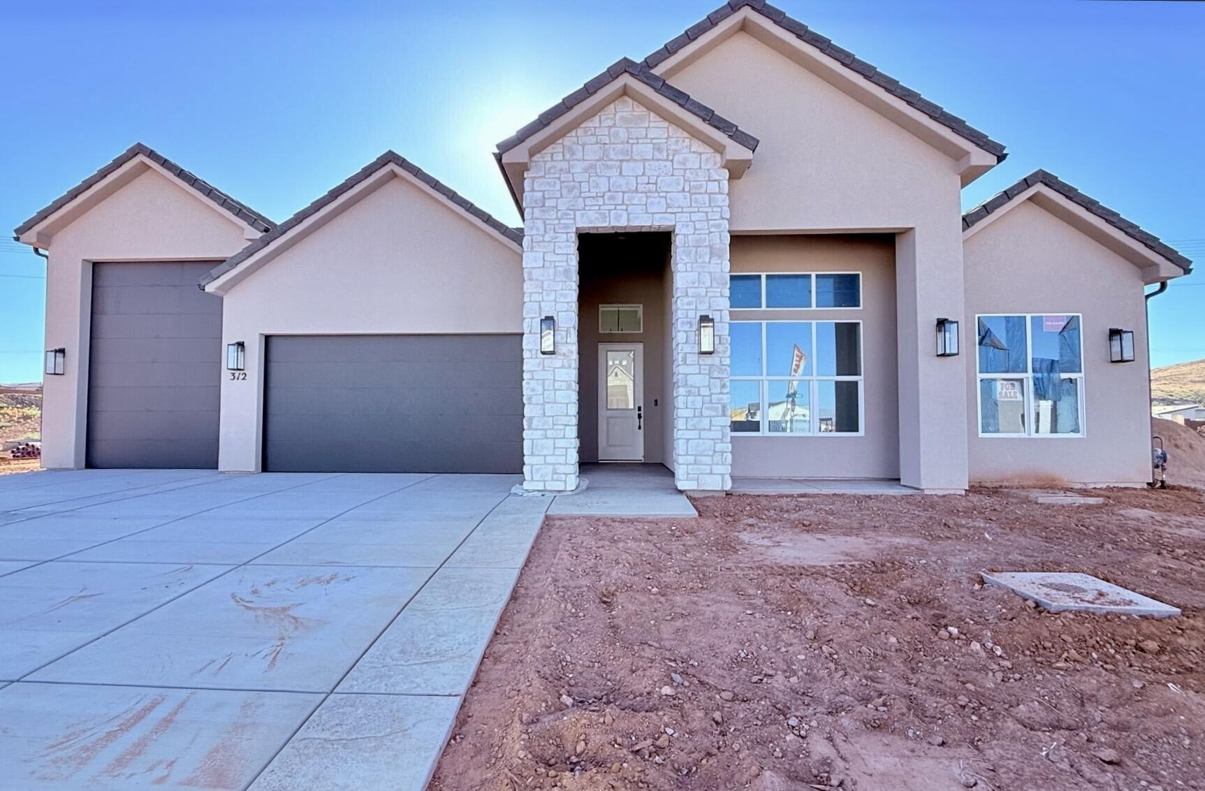 S&S Homes at Paraiso! S&S Homes' popular single story home with RV garage (45' deep with 10'x12' door). This home features painted soft close cabinets, upgraded granite countertops in kitchen, quartz countertops in baths, LVP flooring in main living areas, tiled showers and tubs, tile to ceiling in primary bath, stand alone tub in primary bath, upgraded black plumbing fixtures, upgraded black garage doors, front and backyard landscaping too! Come by and check out the S&S Homes difference! Call or text for additional details or to set up a time to view this home.