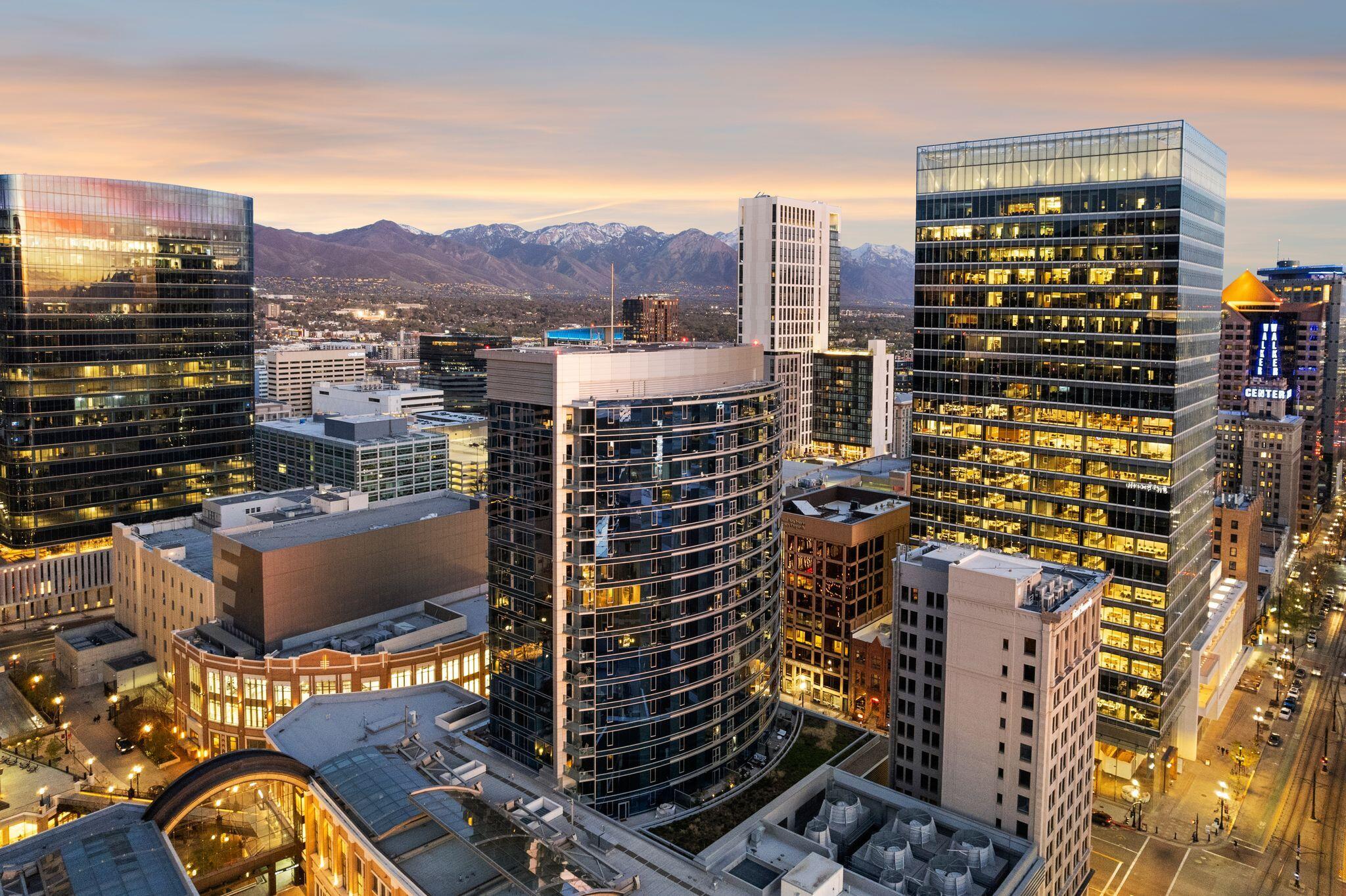 Experience elevated downtown living at The Regent at City Creek, one of Salt Lake City's premier luxury condominium towers. Built in 2011, this striking 20-story, 150 contemporary residences, is known for its sophisticated modern architecture, distinctive blue-tinted glass, LEED Gold certification and exceptional resident amenities. This beautifully appointed condo offers a spacious one-bedroom en-suite, an additional flex room ideal for an office, media room or guest space and a powder bath.  Inside, the thoughtfully designed floor plan features a welcoming great room with a fireplace and breathtaking views overlooking Salt Lake City and City Creek Mall. Step out onto your private balcony to relax and take in the spectacular views. The condo also offers a hallway stackable washer and dryer, pantry and storage space for added convenience, forced air and central A/C with a Nest thermostat and high speed internet for fast, reliable connectivity.  Residents enjoy a private, secure assigned parking space with an EV charger, secure building entry, lobby mailbox access and the convenience of trash disposal on the same floor along with dry cleaning pick-up and drop-off in the lobby. Additional private parking may be available subject to approval.  The Regent's exclusive resident amenities include a swimming pool, hot tub and fitness center, all designed to complement a lock-and-leave luxury lifestyle. Perfectly situated in the heart of downtown, you are surrounded by premier dining, shopping and entertainment, with City Creek Center, TRAX, grocery store, Broadway at the Eccles Theater, Delta Center and Gateway Mall all within walking distance. Enjoy quick access to the freeway, just 14 minutes to Salt Lake International Airport, approximately 25 minutes to the base of Big and Little Cottonwood Canyons and about 44 minutes to Park City, putting world-class skiing, recreation and travel all within easy reach.