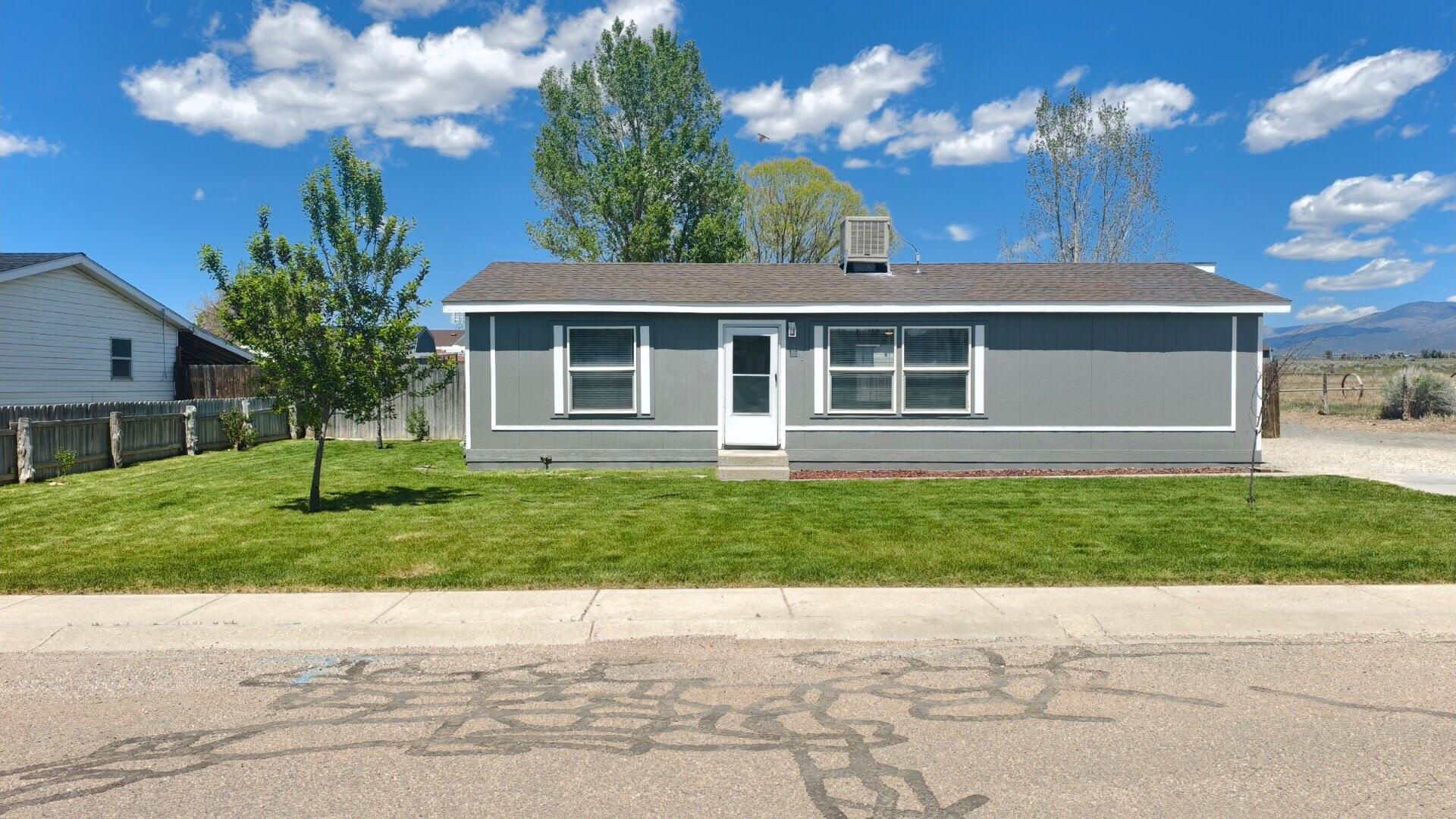 Charming, newly remodeled manufactured home offering 3 bedrooms and 2 bathrooms, situated on a spacious 0.25-acre lot in Beaver, Utah. This move-in-ready property features brand-new flooring with fresh interior & exterior paint. Enjoy the generous outdoor space with plenty of room for parking, gardening. A great opportunity for comfortable living with small-town charm! 'Property is Pending 'Under Contract' with a Time Clause Contingency'