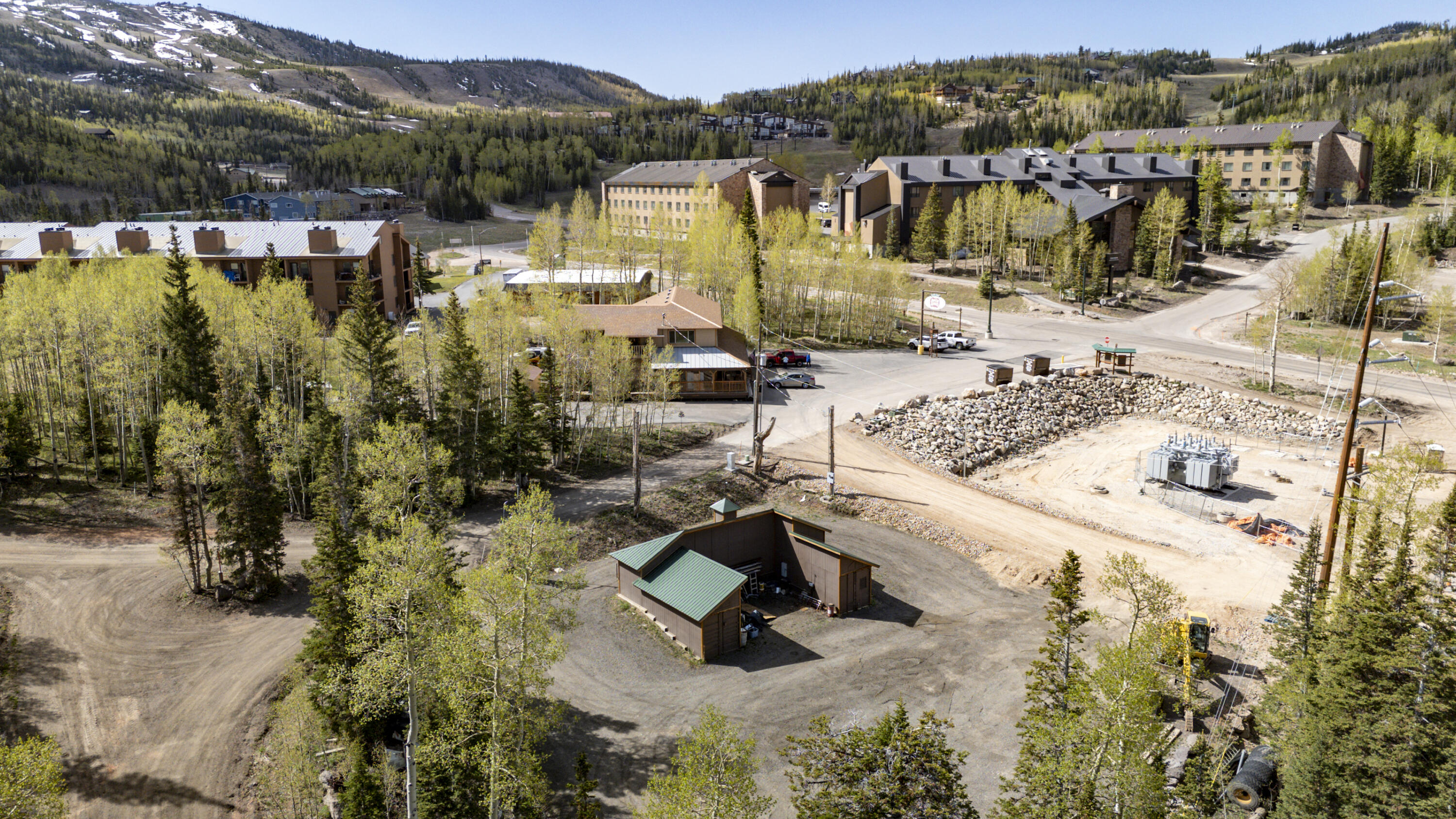 Rare Business Opportunity in Brian Head! This 0.47-acre property has a prime location just off Hwy 143 and approximately 100' (+/-) from the Town ATV/Snowmobile Trail. Zoned Light Industrial - 1 of only 3 such parcels in town - with potential for additional zoning possibilities, this property offers outstanding flexibility for business, investment, or mixed-use development. Ideal for dual-use concept with commercial space below and residential living above. 

Property is graded and finished with a durable RAP surface for functionality. Heated workshop included with electricity, offering immediate workspace or storage, and it can easily be relocated if desired. All utilities have been extended into the lot. Survey and geotechnical report have been completed and are available upon request.