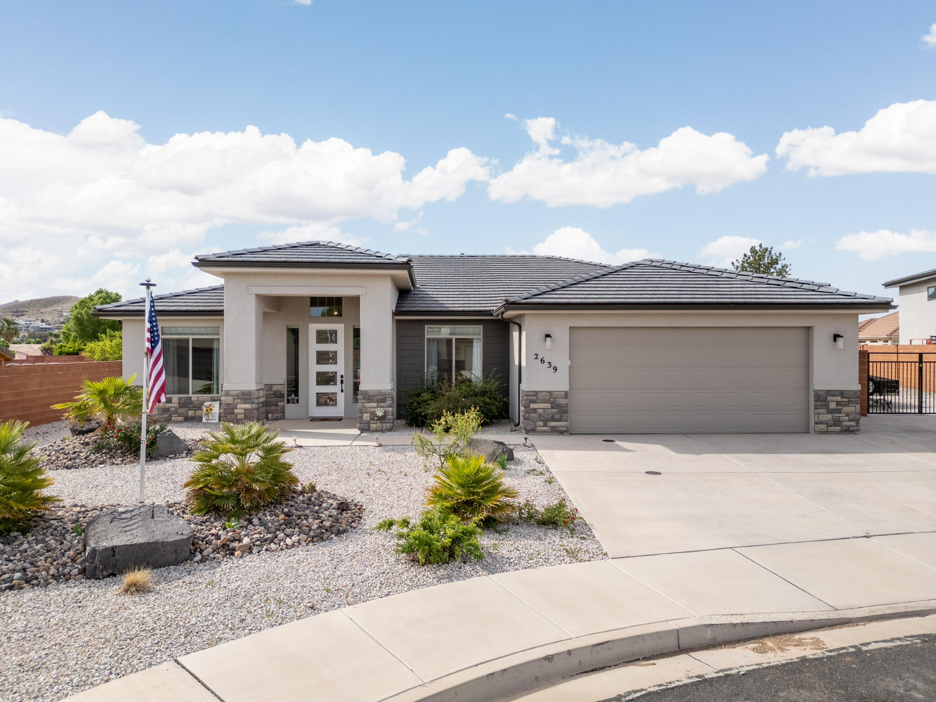 This meticulously maintained, NEARLY-NEW one-level home sits in a peaceful CUL-DE-SAC on a GENEROUSLY SIZED .23 ACRE LOT. Enjoy effortless living with no stairs, while savoring remarkable VIEWS: Pine Valley Mountain graces the front yard, & Zion National Park frames the living room. The UPGRADED KITCHEN showcases stylish two-tone cabinets, & ALL APPLIANCES STAY -- refrigerator, washer, & dryer included -- so you can move in with ease.
Bright, open living spaces flow from the great room to the well-appointed kitchen, with LARGE BEDROOMS that offer comfort & plenty of storage. The outdoors are just as inviting, with AMPLE YARD SPACE & a fantastic SETUP FOR RV OR BOAT enthusiasts: a dedicated parking area with a 30-amp outlet & a sewer drain.
NO HOA means freedom & flexibility, whether you're looking for a primary residence, a second home, or a smart investment property. Located in a QUIET NEIGHBORHOOD just minutes from downtown Hurricane's growing dining & shopping scene, yet CLOSE TO A CITY PARK for easy outdoor enjoyment. Plus, you're only about 20 MINUTES FROM DOWNTOWN ST. GEORGE, combining urban conveniences with a tranquil neighborhood ambiance.
DON'T WAIT for a new build when this nearly-new, SINGLE-STORY home is ready for you to enjoy right now!