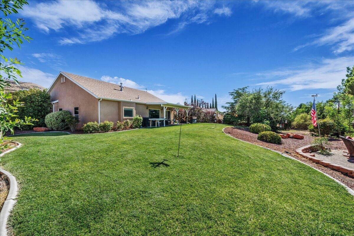 Take advantage of the opportunity to assume a 3.85% interest rate (inquire for additional details) with this beautifully maintained home, ideally situated on a nearly 1/3-acre lot with no HOA. Offering stunning views of Pine Valley and the surrounding landscape, this property combines an exceptional location with space, comfort, and flexibility. Inside, the open-concept floor plan features vaulted ceilings, abundant natural light, and large windows that perfectly frame the northern views. Recent updates to the kitchen appliances, flooring, and interior paint make the home truly move-in ready. Step outside to enjoy mature landscaping, a covered patio, fire pit area, storage shed, RV parking, and plenty of room to expand, add an ADU, or create your dream backyard. An oversized 2-car garage and convenient access to Sand Hollow Reservoir, Southern Parkway, shopping, dining, and endless outdoor recreation make this home an outstanding opportunity. Buyer/buyer's agent to verify all information.