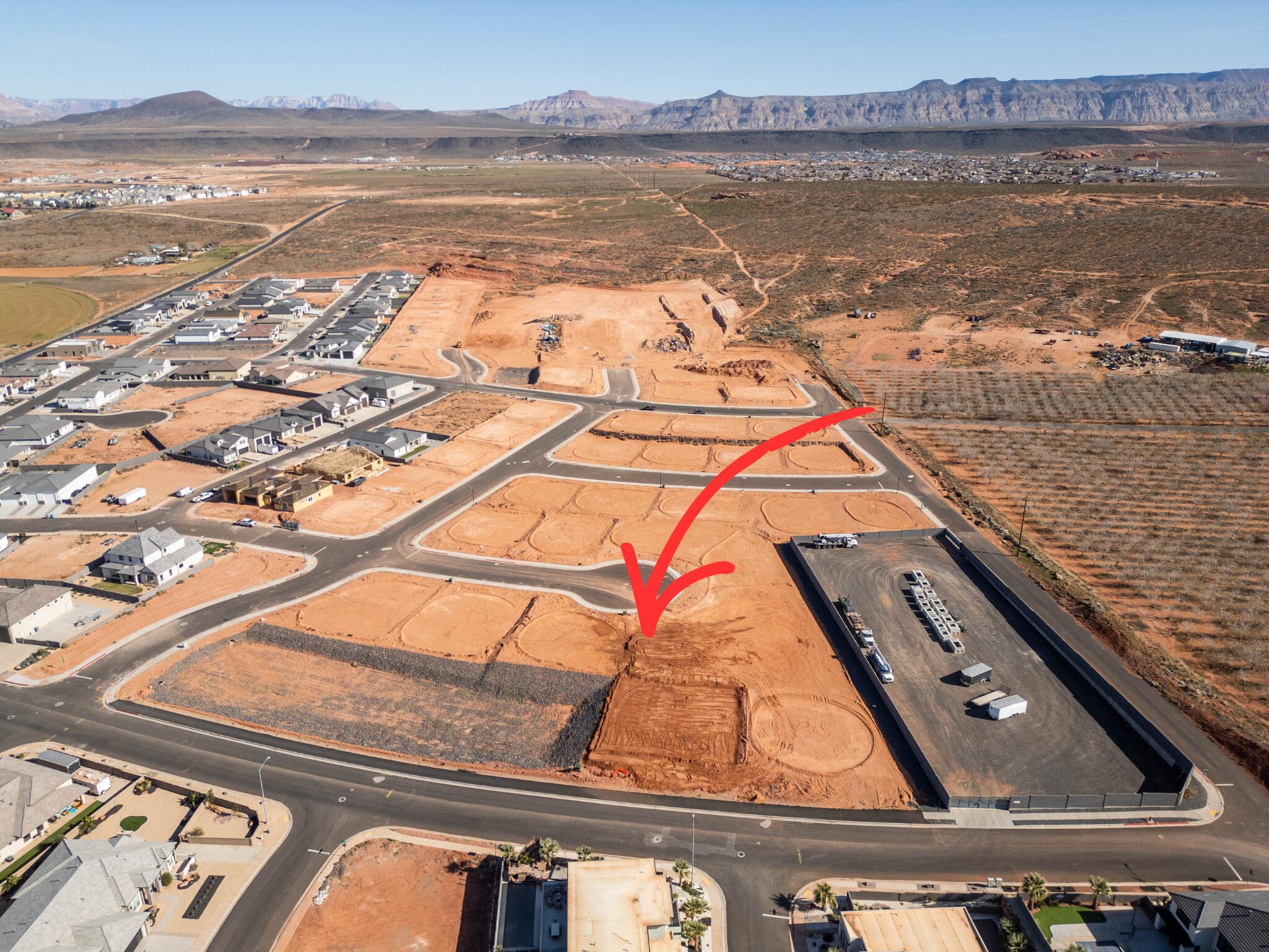 Subdivided lot in a new section of Sand Hollow Village subdivision. No HOA and on Dixie Power. Bring your builder and build the home of your dreams!
