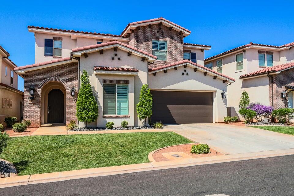 ONE OF THE FEW STAND ALONE UNITS IN COMMUNITY!
Luxury Resort Living in Southern Utah!
This stunning 5-bed, 5-bath former model home offers a turnkey investment and an incredible vacation retreat. Accommodating up to 24 guests, it features an open great room, a spacious rec room, and designer furnishings throughout. Enjoy two private patios and a hot tub for ultimate relaxation.
Let the resort handle rentals when you're away and take advantage of top-tier amenities--clubhouse with games, fitness center, two-tier pool, water slide, lazy river, and pickleball courts. Plus, you're minutes from Tuacahn Center for the Arts, Snow Canyon State Park, and endless hiking/biking trails.
Own a piece of paradise.