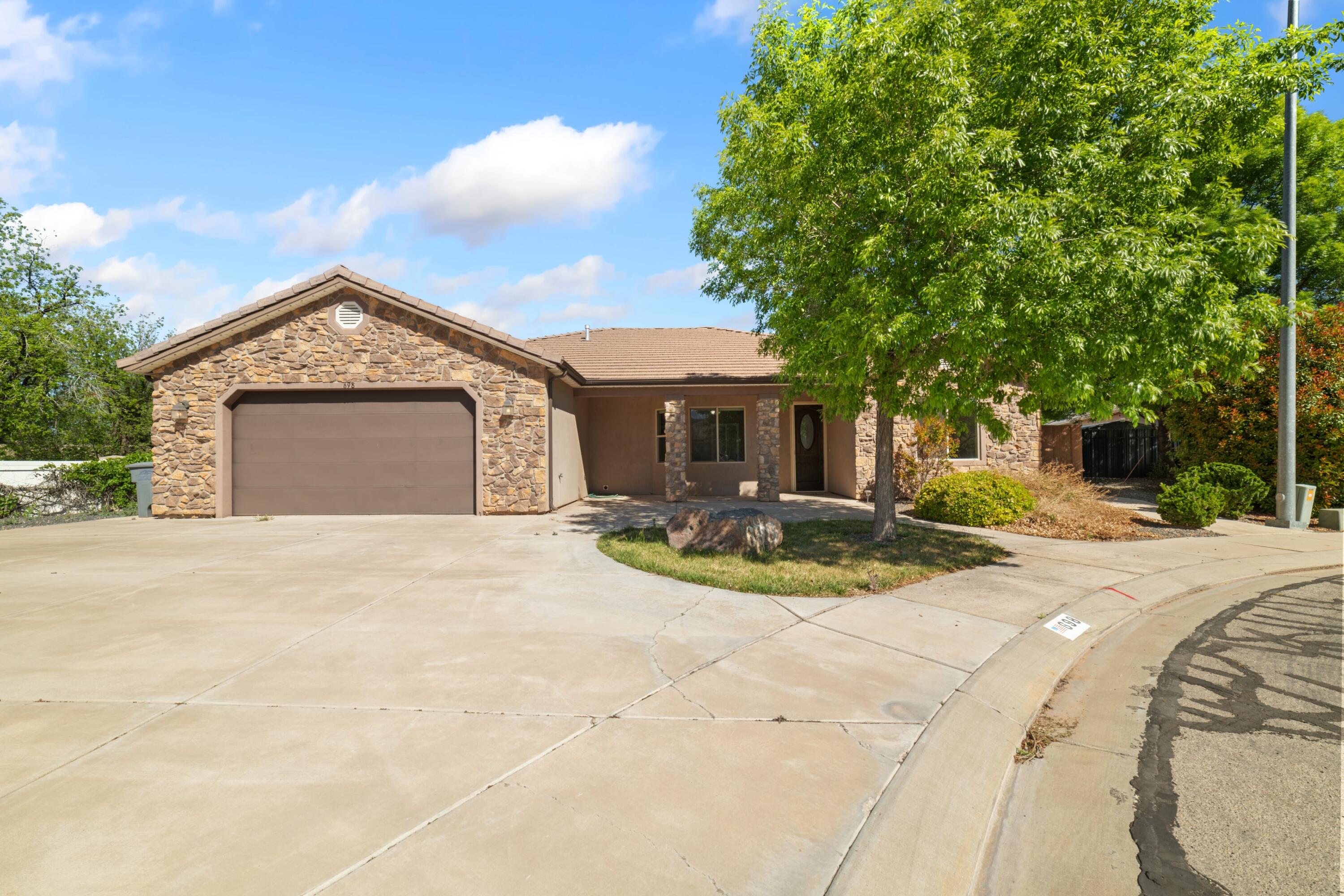 Tucked into the beautiful and quiet Cobblestone Fields subdivision this custom home can be found near the heart of Hurricane. This home is perfect for hosting friends and family with its spacious family room and large open backyard patio with enough room in the yard for a future potential pool if desired! Only a short drive from groceries, entertainment, or restaurants, you won't want to miss this home. All info to be verified by buyer.