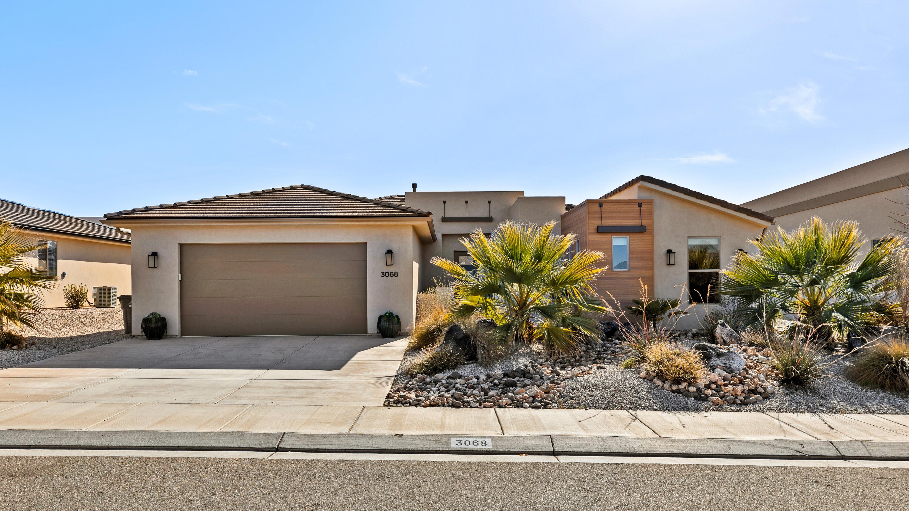 This home features two spacious Master Suites or Primary bedrooms with private en-suite bathrooms and roomy walk-in closets. Ideal for multi generational families or guests. Upgrades include kitchen counter tile backsplash, wainscotting accent walls, energy efficient window tinting, pet door, fully fenced back yard, covered patio, low maintenance desert landscaping and a 3 car tandem garage. This space is great for a third car, workshop or storage. The community HOA features an outdoor pool and pickleball courts.