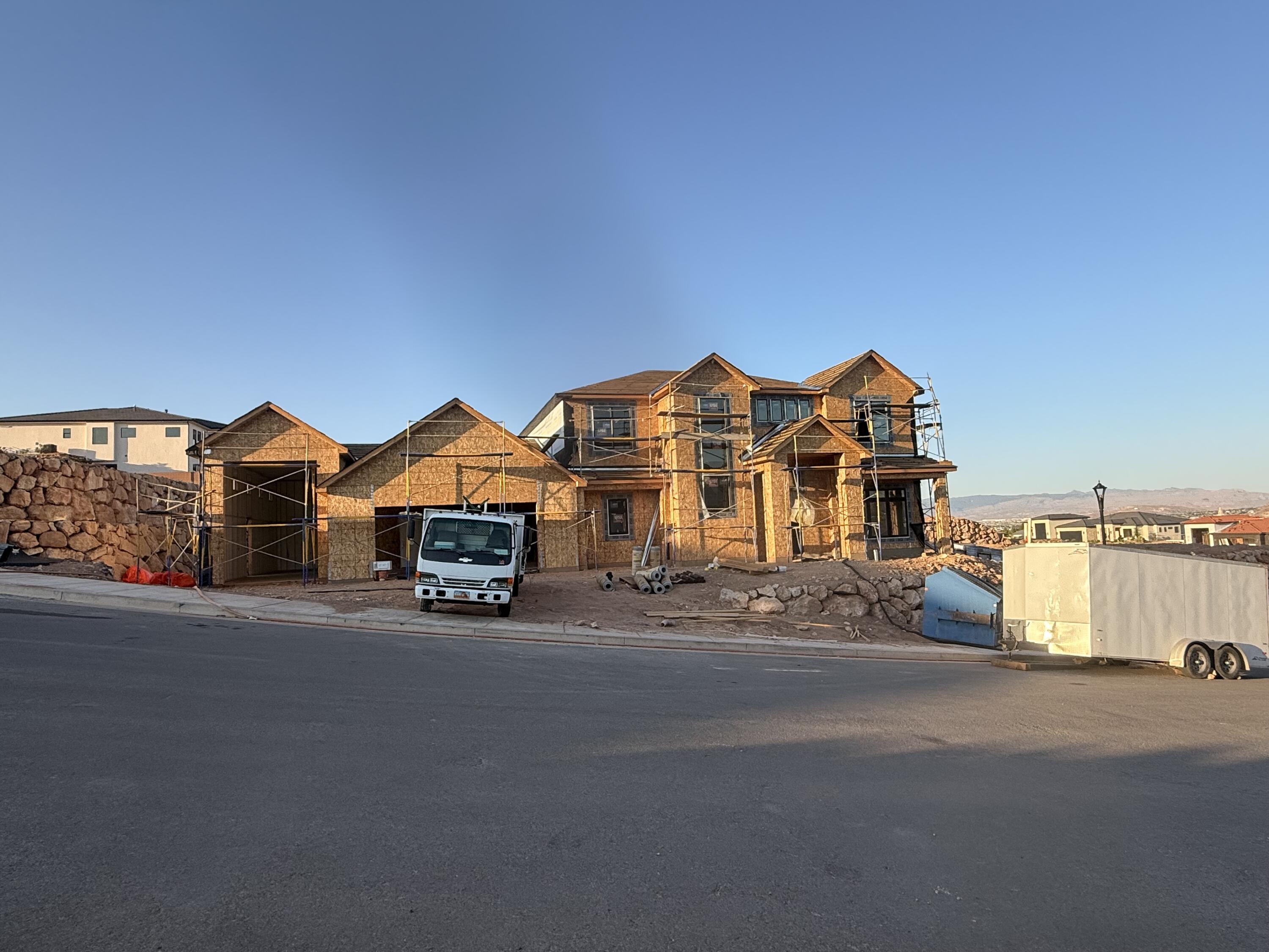 Under Construction with an estimated completion date of 9/2026. Welcome to one of the newest floor plans in The Heights at Washington Bench, where thoughtful design meets elevated living. Offering 4,242 square feet, this stunning home features 6 spacious bedrooms, a dedicated office, and 4.5 bathrooms with a layout designed for both everyday living and effortless entertaining.

Soaring ceilings and an abundance of natural light create an open, inviting feel throughout, while upgraded appliances, a spacious butler's pantry, and beautifully appointed finishes make the kitchen the heart of the home.
Enjoy incredible views, a fully landscaped yard, and exceptional parking with a 4-car garage plus an attached RV garage, perfect for all your vehicles, toys, and storage needs.

Located in the highly sought-after Heights at Washington Bench, you'll appreciate access to excellent schools, the savings of Dixie Power, and one of Southern Utah's most desirable neighborhoods. With quality craftsmanship, generous living spaces, and an unbeatable location, this home offers the perfect balance of luxury, function, and lifestyle.