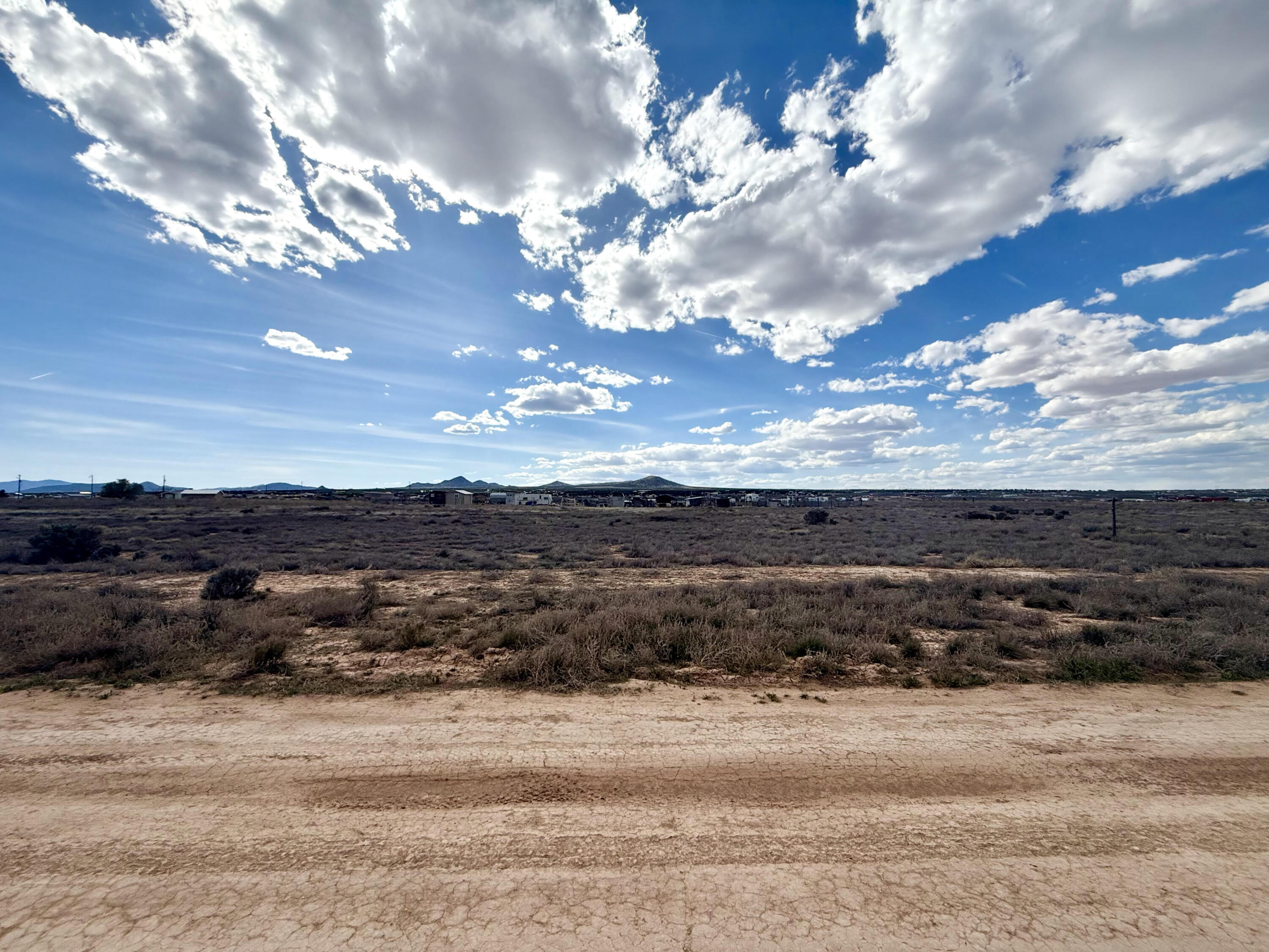 1.23-acre lot located in Cedar Valley Acres just outside of Cedar City. This flat, build-ready property offers an excellent opportunity to build your dream home, establish a farmstead, or create a rural retreat. The property includes 0.5 acre-feet of water with a priority date of 1860, providing valuable water rights in the area. Enjoy open space and expansive views to both the east and west, with plenty of room for animals, outbuildings, or additional improvements. 
Buyer to verify all information, including water rights, utilities, and building requirements.