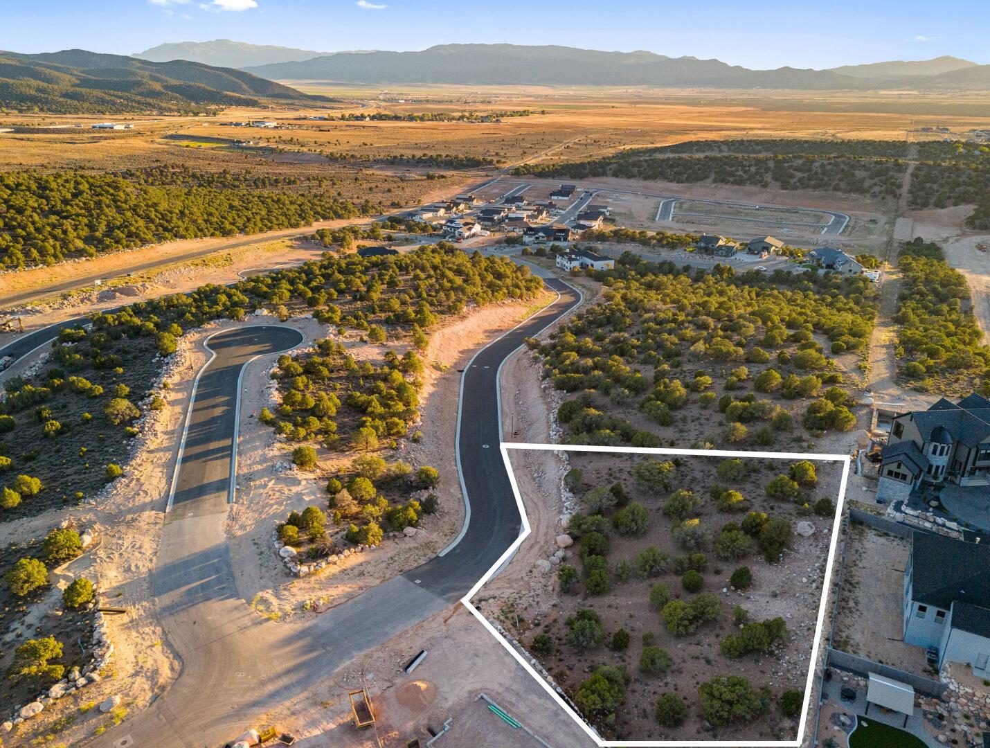 This is Lot Number 20, a 1.08-acre homesite located in the highly sought-after Estates at South Mountain subdivision. Enjoy stunning views of Shurtz Canyon and the surrounding Southern Utah mountains. This growing community is positioned near planned future elementary, middle, and high schools, adding long-term value and convenience. Bring your own builder or choose to build with the South Mountain Development Group. Don't miss this opportunity to secure a premium lot in one of Cedar City's most desirable neighborhoods. No HOA.
