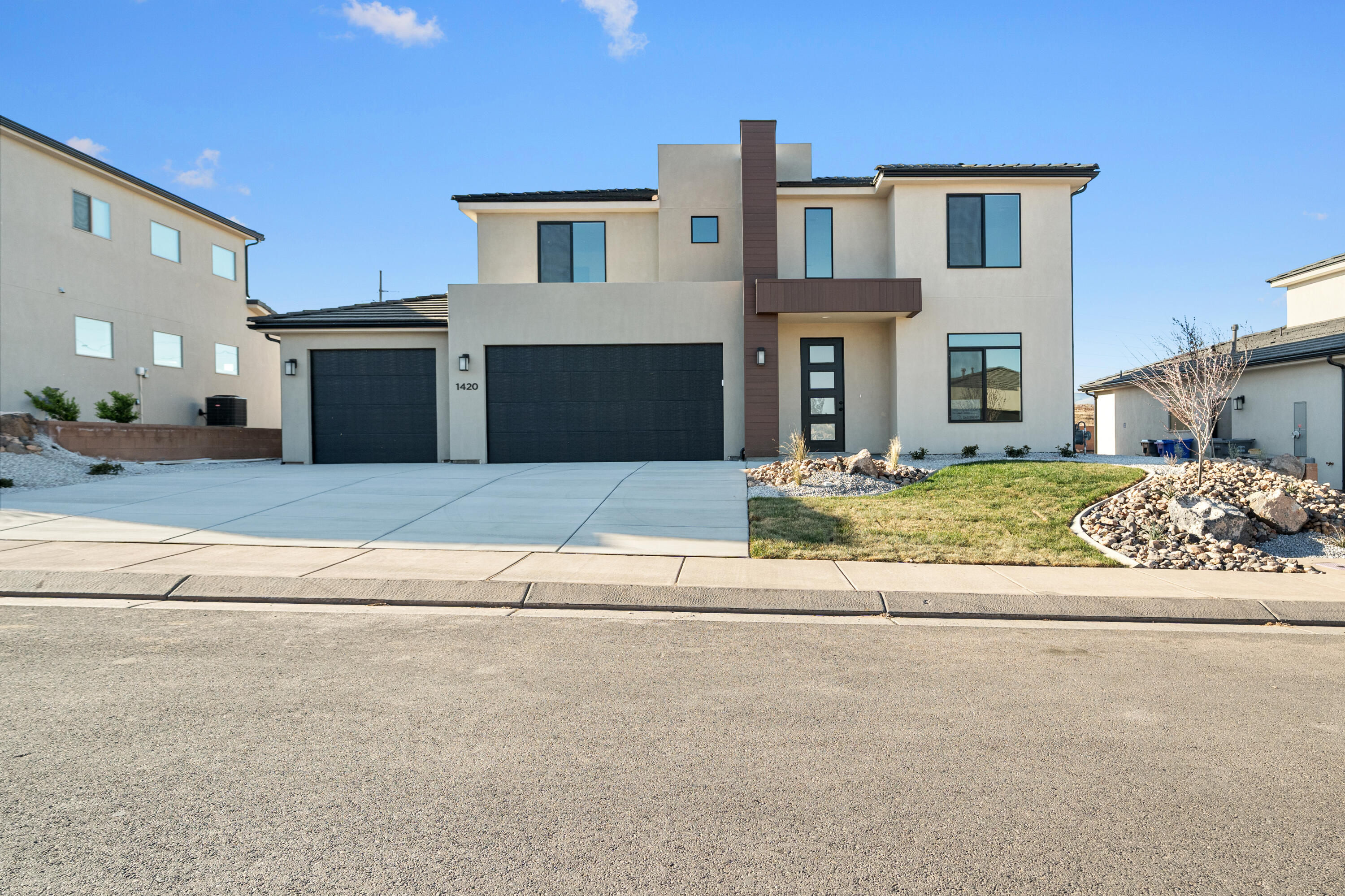 *MOVE IN READY / BUILT AND STANDING* Modern 4-bedroom home with a den, 3.5 bathrooms, and a 3-car garage. Features a spacious second living area upstairs, plus a main-level primary suite with an upgraded bathroom and freestanding tub. The grand kitchen includes painted cabinets, upgraded flooring, and countertops (refrigerator not included). Large backyard with no rear neighbors. Located near the Arizona border, no HOA, and just 10 minutes from the new Smith's Marketplace. Ask about available lender incentives.