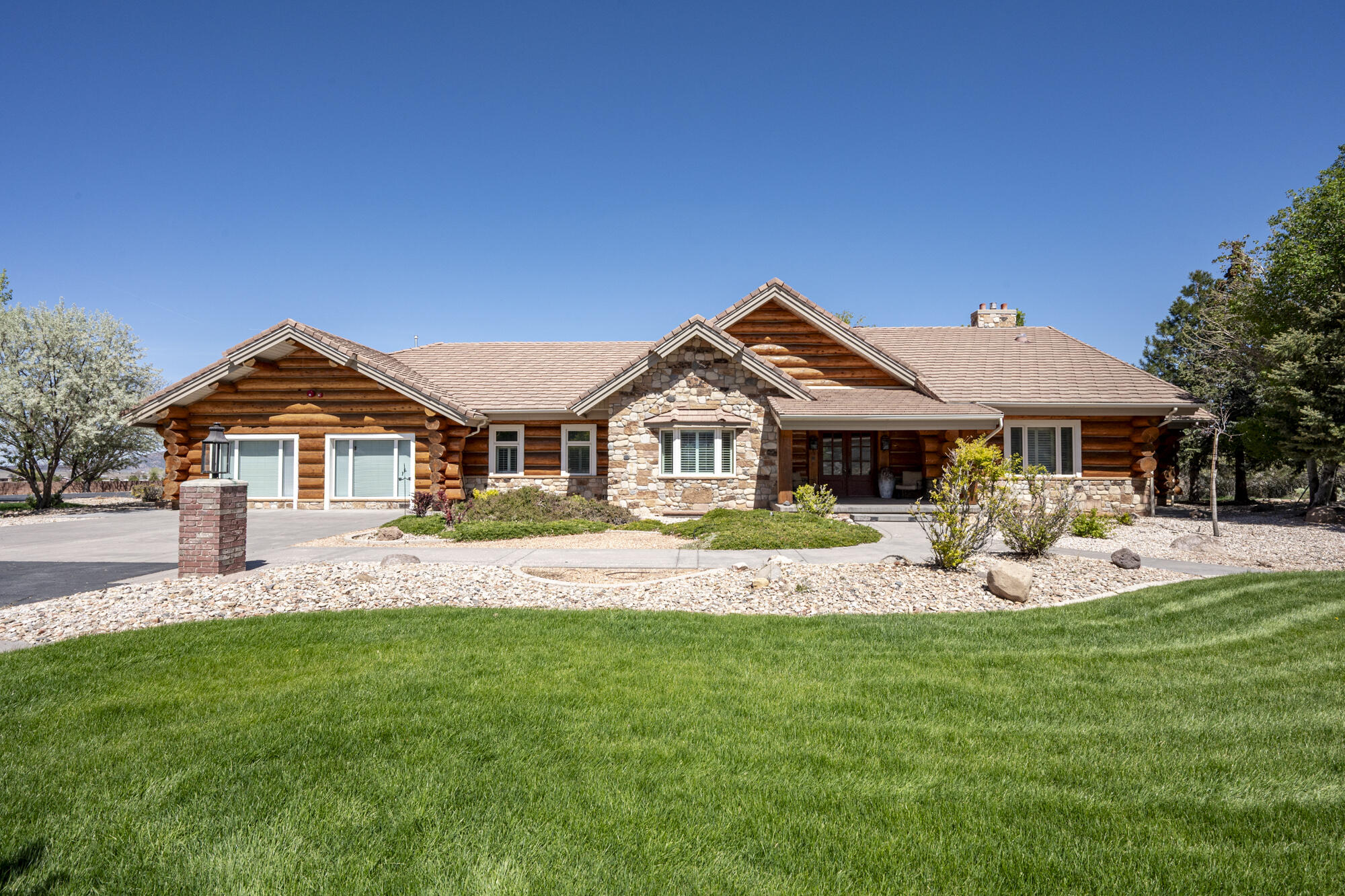 Nestled on 7.5 serene acres in the peaceful countryside of Parowan, this unique property offers endless possibilities. The 8 bed 7.5 bath property is thoughtfully designed with spacious living areas and flexible-use spaces ideal for residential care, multi-generational living, retreat use, or a private estate. Mature trees, open space, sports court, large stone crafted fire pit and scenic mountain views create a welcoming setting. The expansive acreage provides room for outdoor recreation, gardening, animals, or future improvements, while the established landscaping adds beauty and tranquility throughout the grounds. Whether you are seeking an investment opportunity, a specialty-use property, or a one-of-a-kind residence with room to grow, this exceptional property is full of potential.