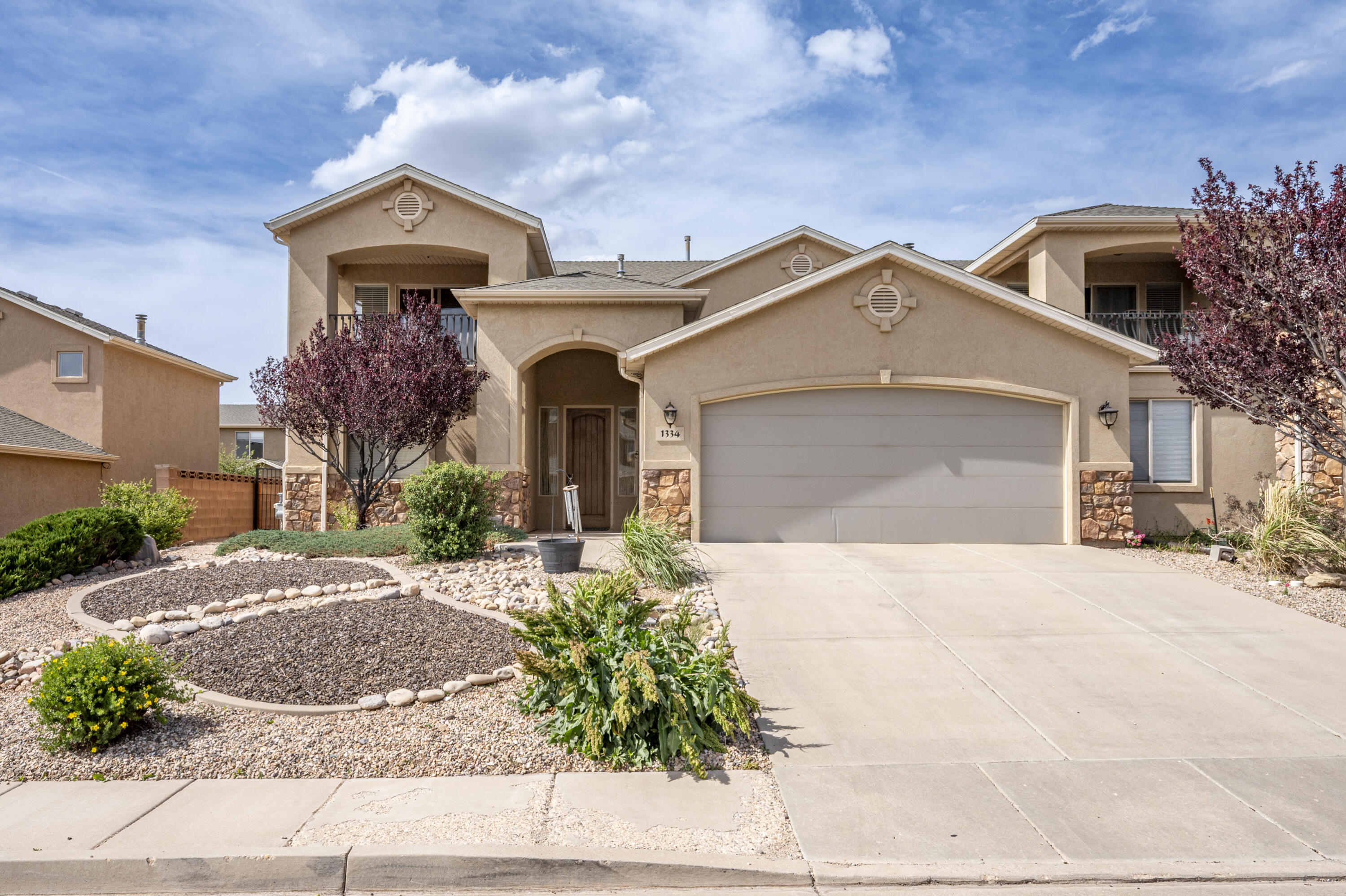 Flexible, functional, and move-in ready! This home offers thoughtful living across two levels with 1 bedroom, a full bath, and laundry on the main floor, plus 3 additional bedrooms and 2 bathrooms upstairs. Enjoy a cozy gas fireplace in the living room, granite countertops and tile floors in the kitchen, and a built-in desk on the main level, perfect for a home office or homework station. The spacious primary bedroom is a true retreat with an ensuite bath and private balcony showcasing incredible mountain views. Step outside to a fully fenced backyard complete with a custom pergola and dedicated garden area with grow boxes. Conveniently located on the south end of Cedar City near Providence Center shopping and dining, with Southview Trailhead access right out your front door. No HOA! As you arrive, the home's attractive curb appeal immediately stands out with a combination of stucco and stone accents that give the exterior an elevated feel. The south-facing orientation is not only inviting but also practical, helping encourage natural snow melt during the winter months. Low-maintenance landscaping adds to the clean and welcoming appearance while keeping upkeep manageable year-round.

Step inside to an inviting foyer featuring elevated ceilings, durable tile flooring, and a convenient coat closet just off the entry. Straight ahead, the dining area creates a natural gathering space and is perfectly positioned with sliding glass doors that provide easy access to the backyard. The dining area flows seamlessly into the kitchen, where you'll find granite countertops, ample cabinetry, tile flooring, and a spacious corner pantry that offers excellent storage and functionality for everyday living or entertaining.

The living room feels bright and comfortable thanks to expansive windows that allow natural light to pour into the space. A cozy gas fireplace creates a warm focal point, making the room feel inviting throughout every season.

Just off the entry, the main-level bedroom offers excellent flexibility depending on your needs. Whether used as a guest room, home office, workout space, or additional bedroom, the layout allows for a variety of options. This room connects to a full bathroom with secondary access near the laundry area. Nearby, a built-in desk area provides the perfect location for a home office, homework station, craft area, or organization space.

Upstairs, you'll find three additional bedrooms and two full bathrooms, including a spacious primary suite designed to feel like a true retreat. The large bedroom features private access to its own balcony where you can enjoy incredible mountain views and peaceful mornings or evenings outdoors. The ensuite bathroom offers dual sinks, a glass-paneled shower, a separate soaking tub with a "spa-like" feel, and a generous walk-in closet with plenty of storage space.

The backyard was designed with both relaxation and functionality in mind. A covered patio leads to a beautiful custom pergola situated on stamped concrete, creating an inviting outdoor living and entertaining area. The fully fenced yard offers privacy and security, while a side gate provides convenient backyard access. Garden enthusiasts will appreciate the dedicated garden space complete with grow boxes, offering room to grow flowers, herbs, vegetables, or customize the area to fit your outdoor lifestyle.

The attached 2-car garage is currently used for parking, storage, and a workout space, showing the versatility and the options available to you. In addition to the garage, the concrete driveway provides off-street parking, with additional street parking available directly in front of the home for guests or extra vehicles.

One of the added benefits of this property is that there is no HOA, giving homeowners more flexibility without monthly association dues. CC&Rs are in place to help preserve the overall appearance, charm, and upkeep of the neighborhood. Per the CC&Rs, short-term rentals are possible, providing additional flexibility for owners looking for investment or rental opportunities.  

Located on the south end of Cedar City, this home offers quick access to I-15, shopping, dining, and everyday amenities, including the nearby Providence Center. Outdoor recreation is truly at your doorstep with the Southview Trailhead located just steps away. This extensive trail system offers approximately 30 miles of trails designed for mountain biking, hiking, and trail running, making it easy to enjoy Southern Utah's incredible scenery and active lifestyle year-round.

3 minutes to I-15
5 minutes to restaurants and shopping at Providence Center
7 minutes from Southern Utah University
8 minutes to Downtown Cedar City
11 minutes to Cedar City Regional Airport
13 minutes to Cedar City Intermountain Hospital
45 minutes to St George
2.5 hours to Las Vegas
3.5 hours to Salt Lake City