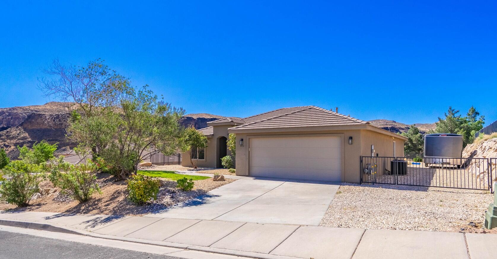 Wonderfully maintained. Large 1/3 acre lot! No HOA! Great neighborhood with 180 degree  mountain and city views to the south, east, and west. RV parking. Easy to show.