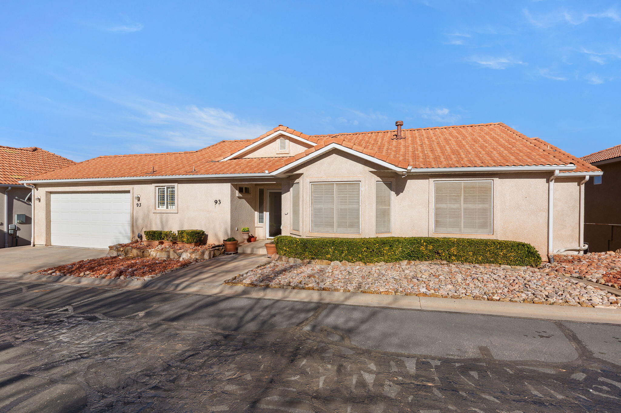 Another $10,000 Price Reduction. Original Owner was in love with the view! This outstanding view is picturesque showing the mountains and valley throughout this well-maintained and loved home. Mrs. Clean lived here. Features include 4 bedrooms, 3.5 baths, rooms, jetted tub, oversized garage, 3 patio areas to enjoy mother nature and the views, roomy basement living for friends and family to visit with an outside entrance and more. Located in a 55+ community with low HOA monthly dues of$108 which includes great amenities, indoor pool, exercising area, clubhouse, outdoor activities, private road and more. Close to Washington County recreation center, many trails, shopping, restaurants and the freeway.