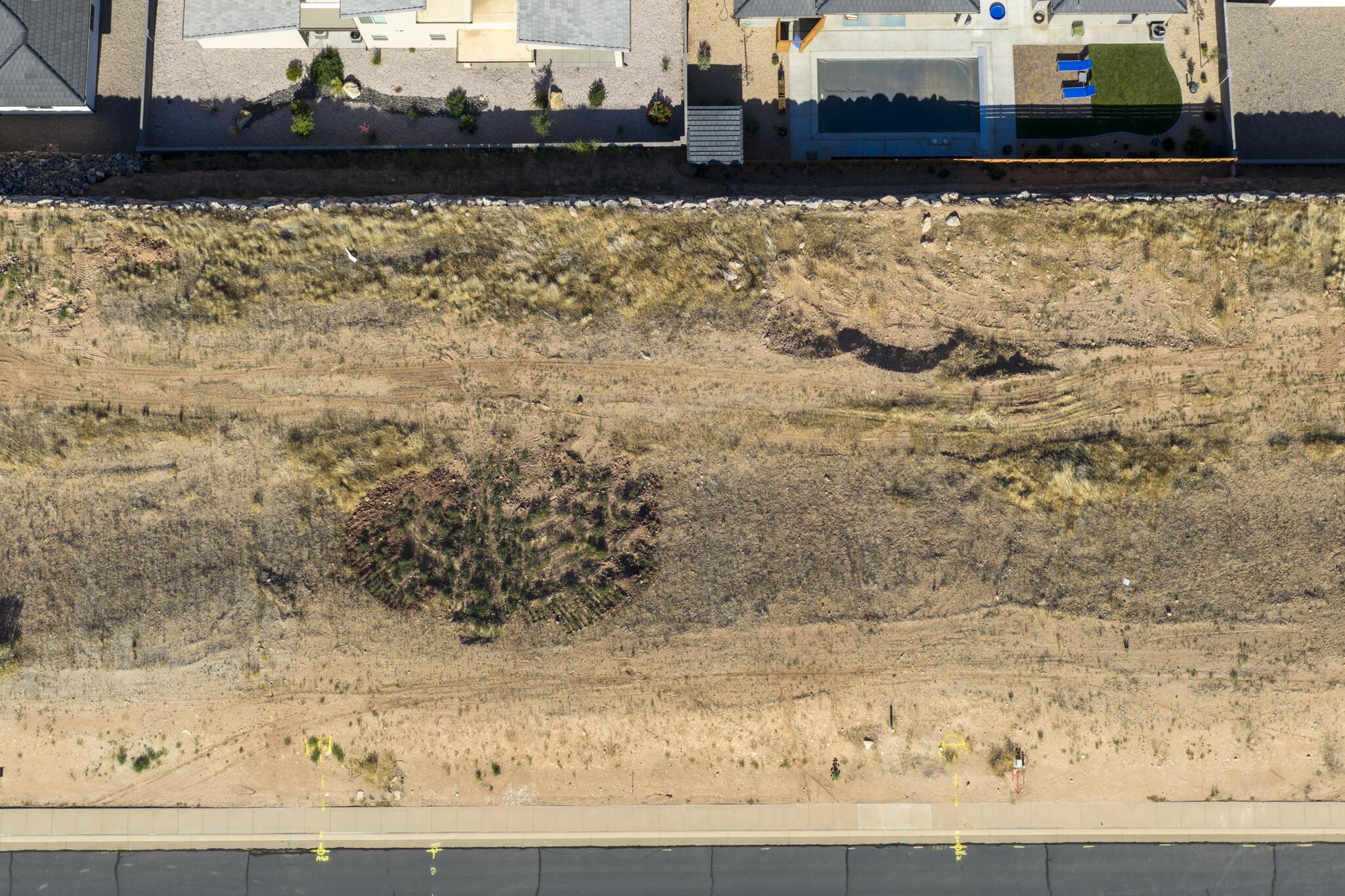 Conveniently located in La Verkin just minutes from Zion National Park, this .23 acre lot has walk-out basement potential. Providing the perfect opportunity to build in Southern Utah without the burden of HOA fees, this affordable building lot has a lot to offer. Tucked into a relaxed neighborhood, you will enjoy sweeping views of the valley and surrounding red rock mesas without paying premium resort prices.