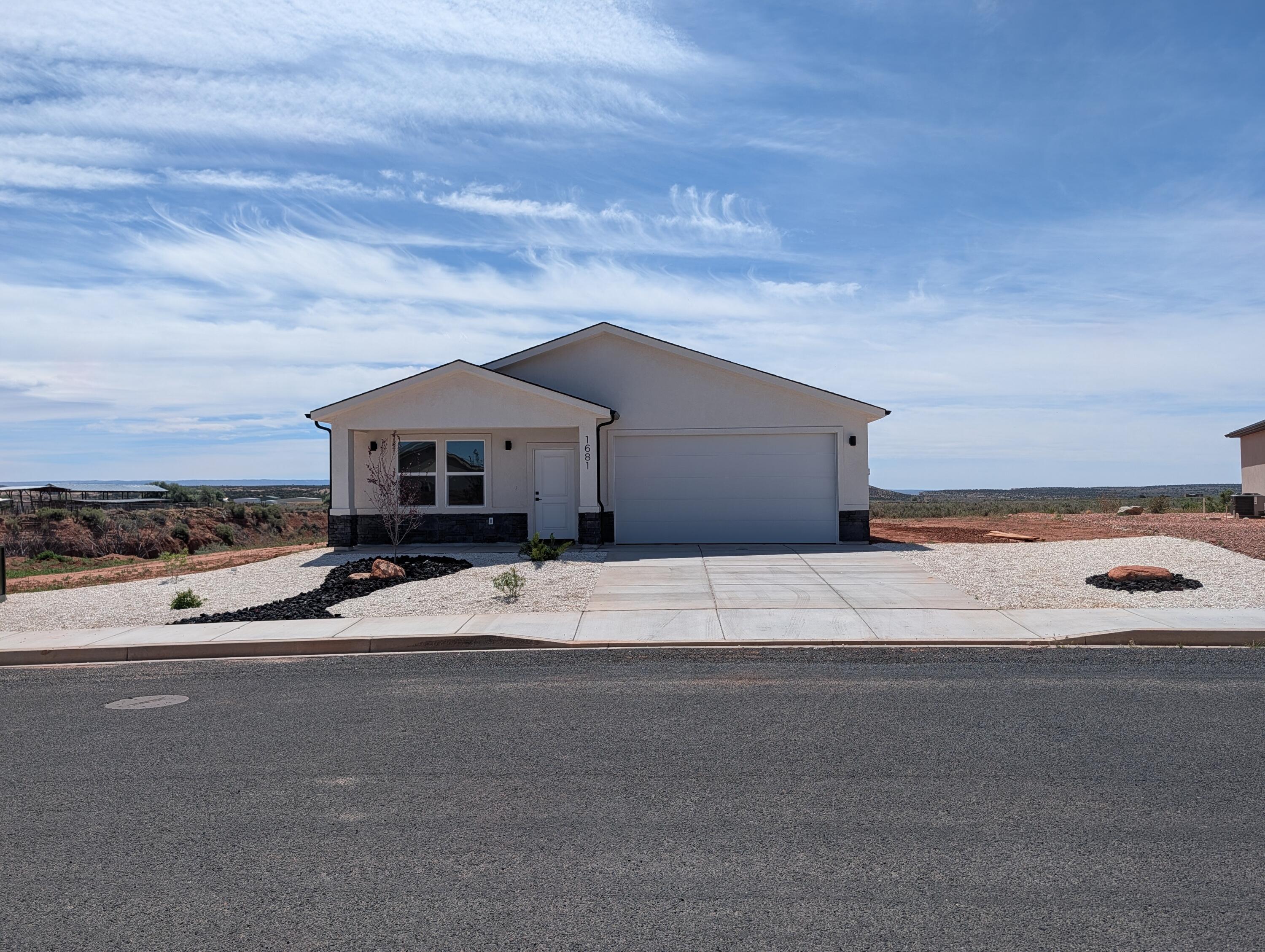 Set on a generously sized lot with no backyard neighbors, this 1,309 sq ft home delivers privacy and wide-open views that stretch beyond your fence line. Step inside and you'll find a clean, modern layout with 3 bedrooms and 2 bathrooms, designed for easy living whether you're settling in full-time or creating a getaway.
The open-concept design connects living, dining, and kitchen areas seamlessly, making the space feel larger than its footprint. Natural light pours in, and the back of the home becomes the focal point--framing those uninterrupted desert views that make Kanab so special.
What stands out here isn't just the home--it's the opportunity. With Kanab's growing popularity as a destination near Zion, Bryce Canyon, and Lake Powell, this property positions itself as a strong candidate for a vacation rental, second home, or investment hold.
Brand new construction means low maintenance, modern efficiency, and a fresh start--no projects, no updates, just move in and enjoy.

If you've been looking for a clean, well-built home with space behind you and potential ahead of you, this one checks the boxes.