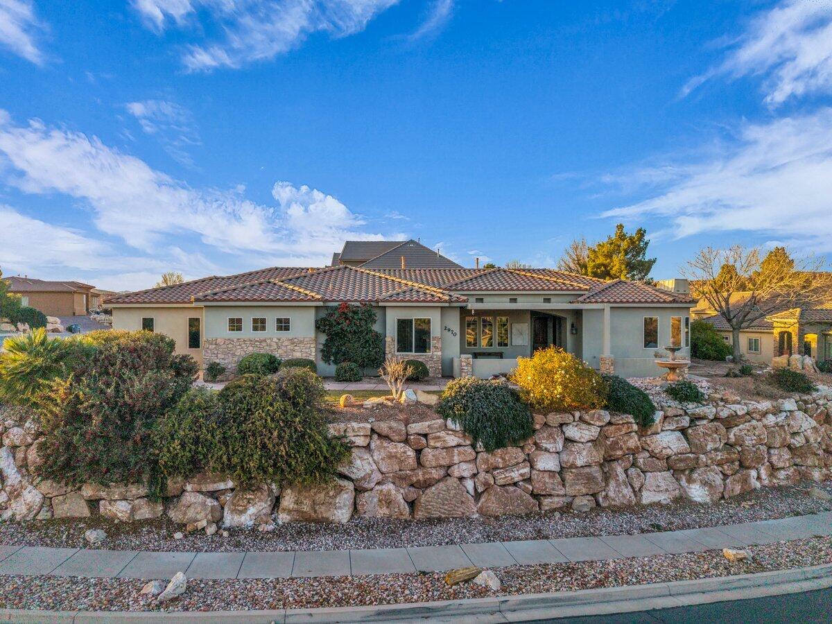 Saltwater Pool & Views! This stunning custom-built, upgraded home is perfectly positioned on an expansive corner lot, over 1/3 of an acre, in the highly sought-after Knolls neighborhood of Little Valley. Thoughtfully designed and meticulously maintained, the spacious and efficient floorplan showcases a luxurious primary suite complete with a walk-in shower, relaxing jetted tub, and an oversized walk-in closet, along with a large laundry room and generous storage throughout. Step outside to your private backyard oasis featuring a beautiful saltwater pool, a large, covered patio ideal for entertaining, full fencing, and breathtaking city and mountain views. Built with quality craftsmanship, premium materials, and timeless finishes, this home also enjoys the benefit of Dixie Power for affordable, energy-efficient living year-round. An oversized 3-car garage adds exceptional convenience, all just minutes from shopping, schools, parks, and a variety of local activities. Buyer to verify all information, deemed reliable, however buyer to verify all info including utilities, rental restrictions, and HOA information if applicable. affordable, energy-efficient living year-round. An oversized 3-car garage adds exceptional convenience, all just minutes from shopping, schools, parks, and a variety of local activities. Buyer to verify all information, deemed reliable, however buyer to verify all info including utilities, rental restrictions, and HOA information if applicable.