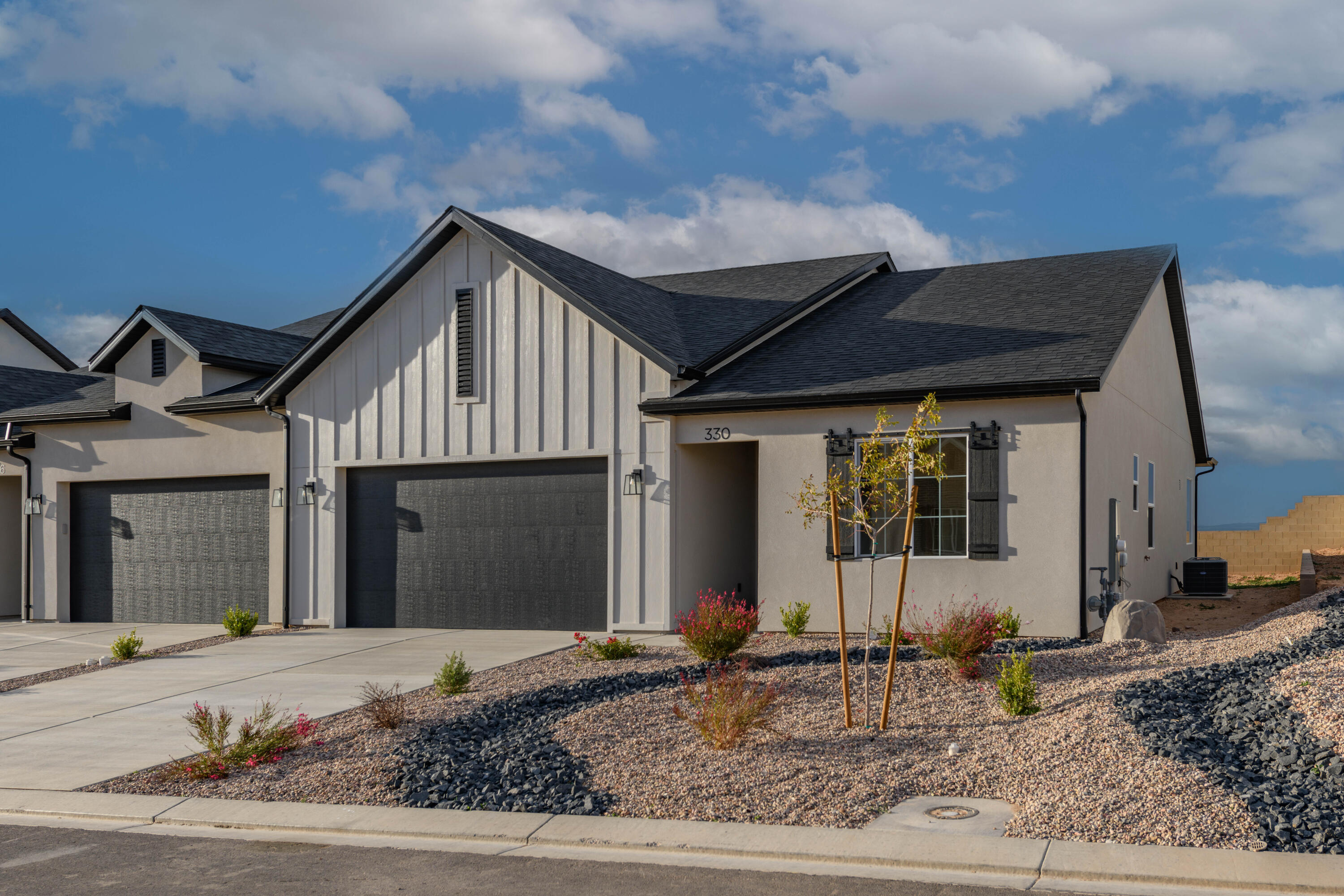 Discover your dream home under construction and ready to impress! This thoughtfully designed 3 bedroom 2 bath home offers a spacious layout with high end finishes throughout. Enjoy a deluxe glass shower in the master suite adding a touch of luxury to your daily routine. The home also features durable tile flooring in the laundry room providing both style and functionality. Step outside to a covered patio perfect for outdoor relaxation, and a professionally designed front yard enhancing curb appeal. Don't miss this opportunity to own a brand-new town home!
