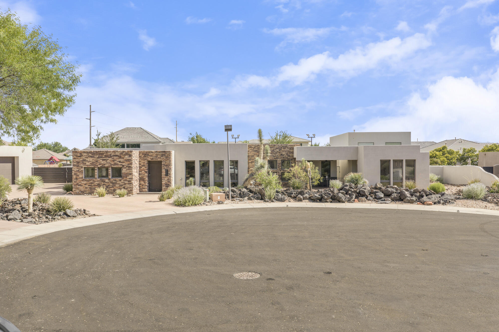 Incredible home in the sought-after Lava Cove at Entrada on a private .42-acre cul-de-sac lot with stunning Red Mountain View's. Recent improvements include a brand-new roof, fresh exterior paint, and a newly finished theater room / entertaining space in the detached garage. Inside, enjoy an open-concept floor plan, sunken living room, gourmet kitchen with Thermador appliances, luxurious primary suite, private casita with kitchenette, and detached office. The backyard is designed for entertaining with a covered spool/hot tub, mature landscaping, and multiple outdoor living spaces. Enjoy resort-style living with access to Entrada's premier amenities, including pools, fitness center, pickleball, tennis, walking trails, and more. Reach out with any questions and schedule a private showing today!