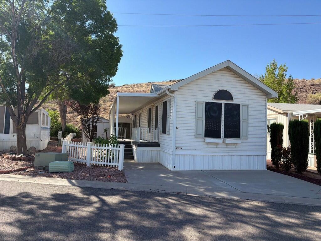 Affordable owned-lot opportunity in Cherokee Springs RV Park, an established 55+ community in the heart of Washington City. This park model home offers approximately 560 sq. ft. with 1 bedroom, 1 bathroom, and added functional utility from a separate air-conditioned bonus room with exterior access. Also a covered deck, storage shed, and low-maintenance living.
Convenient location near shopping, services, medical facilities, Washington City Community Center, library, cemetery, and Southern Utah recreation. Property is being offered as-is and is priced with consideration for needed cosmetic updating, including carpet and interior paint. On-parcel parking is limited; nearby community/open parking is available a short walk away. Buyer to verify all information, including square footage, condition, HOA dues, 55+ occupancy requirements, parking, rental restrictions, financing eligibility, and permitted status of any additions or improvements. This property may qualify for Seller Financing (Vendee). Please Read ALL Attached Documents includingVA IMPORTANT INFORMATION Located in DocumentsSection. Property is sold 'AS-IS/WHERE IS', NO Property Disclosures or Repairs. BUYER To Verify ALL.