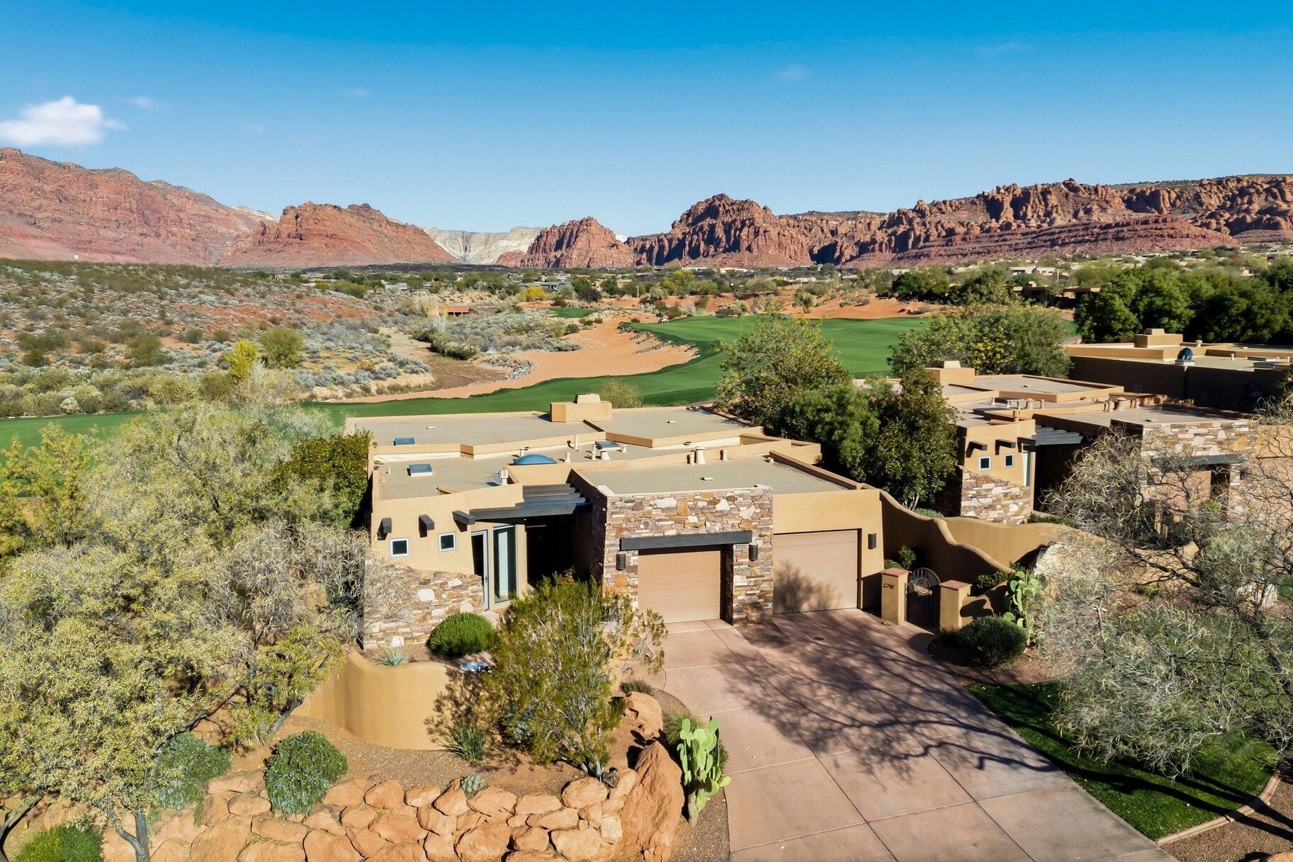 Rare opportunity to own a 50% ownership of this amazing property at The Inn at Entrada. The Inn offers fully furnished short term rental (STR) zoned residences within the guard gated side of Entrada that include on-site concierge, hotel-style rental program, full access to the wellness center amenities including pool, spa, on-site instructor led classes, spa services, and to the Entrada golf course. For at least the last decade and under the share profit model program, owners in the rental pool have had the privilege of owning their unit free and clear of all maintenance cost, furniture replacement cost, HOA fees, and Equity Membership monthly fees. The only cost that the owners are responsible for are cleaning fee for their stay (optional), property taxes, and any financing fees. At this time, there is absolutely no other STR program like it in Southern Utah. Owners can arrange with the concierge to book their stay. Although they are not guarantee to stay in their unit, the Inn attempts to always give them access to it. There are currently 29 properties in the rental pool so an owner can stay in any other available unit. In the event that the Inn has a 95% occupancy, the owners may have fees associated with their stay. For the last decade or so these fractional owners have earned anywhere from $9k to $12k net profit a year. This unit comes with an golf course equity membership that is currently valued at $125,000, and has a waiting list 8 applications. However, the owners of this 50% fractional the ability to get access to Entrada's Troon Prive Golf Course anytime outside of their stay in the Inn immediately. Buyers will be responsible for all transfer fees upon closing. The Equity membership transfer fee is $37,500, and Rental Pool Application fee is $25,000.

This single-family detached home is 1,968 SqFt, 2 lockout ensuite bedrooms with full kitchen and a studio with a kitchenette providing flexibility for personal use and strong rental potential. The home also includes a 2 car garage, and great covered patio area with outstanding golf course and Red Rock Mountain views. The ownership also includes a full equity Entrada golf membership, combining lifestyle and investment without the burden of maintenance.

Step through the courtyard into a bright, open living area with a custom kitchen, and enjoy a primary suite with large windows, a soaking tub, and serene views. The home sits on the 9th green of the Entrada Golf Course, recently redesigned by renowned architect David McLay Kidd and recognized as the #2 course in Utah. Part of the Troon Privé network, Entrada's par-72 course stretches 7,280 yards across some of Southern Utah's most stunning desert landscapes. Residents enjoy world-class amenities, including indoor and outdoor pools, a fitness center with classes, a clubhouse with dining, tennis and pickleball courts, a playground, and a full-service wellness spa. Located in Saint George, the community is close to PGA and LPGA events, the St. George Marathon, Red Bull Rampage, and nearby national and state parks, including Zion, Bryce, Snow Canyon, Sand Hollow, and the North Rim of the Grand Canyonoffering an unparalleled blend of luxury, recreation, and natural beauty.  

All information herein is deemed reliable but is not guaranteed. The buyer is responsible to verify all listing information, including square footage/acreage, to the buyer's own satisfaction.