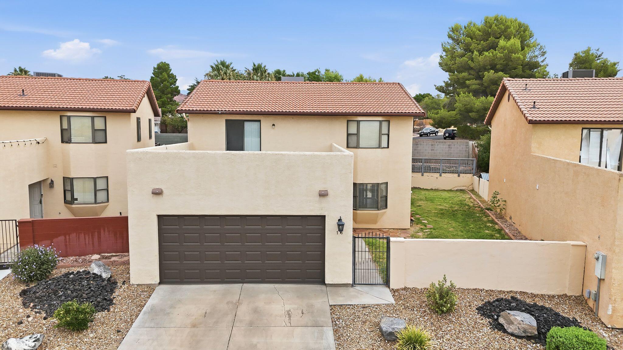Welcome to this beautifully well maintained two-story single-family home located in one of St. George's most desirable and convenient neighborhoods. Offering 1,792 square feet of living space, this home features 5 spacious bedrooms, 2.5 bathrooms, and a 2-car garage with a brand-new garage door. The A/C unit is fairly new, and the home includes quality appliances, making it truly move-in ready. Enjoy the spacious side and backyard patio, perfect for entertaining, relaxing, or spending time with family and friends. Built in 1993, this property is ideally situated just minutes from parks, restaurants, shopping, Summit Athletic Club, banks, gas stations, the Intermountain Health (IHC) clinic, and many other everyday conveniences. This is a fantastic opportunity to own a home in a prime St. George location--it's a must-see!