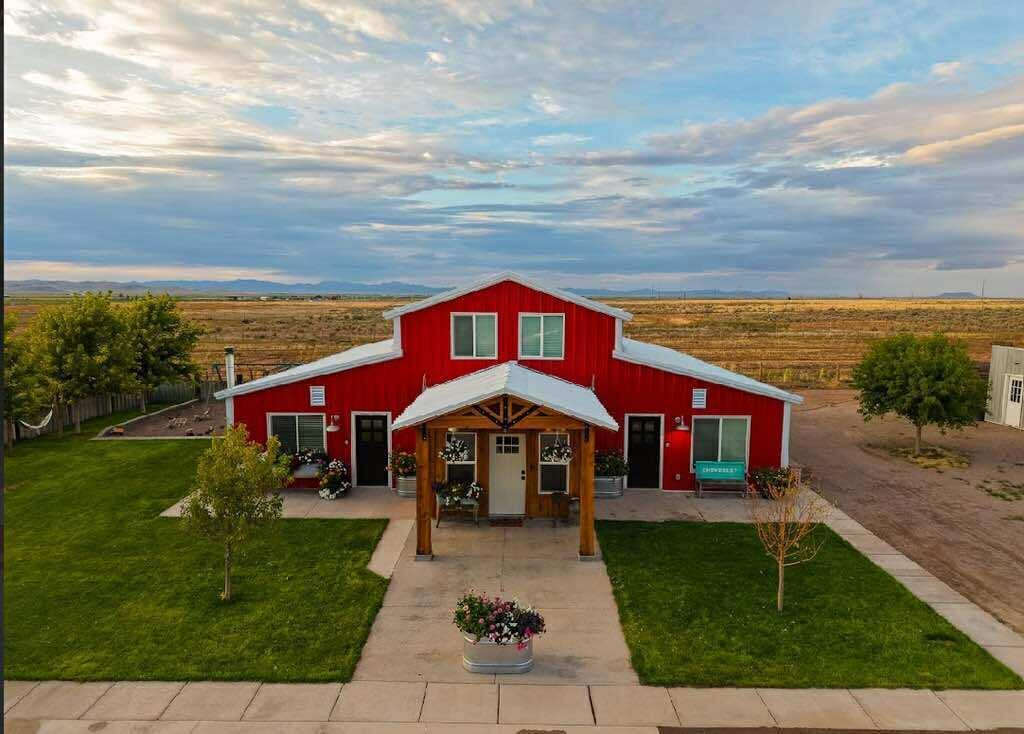 Welcome to a truly unique and versatile property that blends rural charm with modern infrastructure, designed for those who dream of space, sustainability, and opportunity. Situated on 2.34 private acres with the potential to double your land through an adjacent 2.34-acre parcel also available for purchase, this property is more than a home - it's a lifestyle.

With 4 spacious bedrooms, den, 2.5 bathrooms, and 3,500 square feet of thoughtfully planned living space, this home offers ample room for families of all sizes, multi-generational living, or even the possibility of converting into a duplex or multi-family dwelling thanks to forward-thinking design and infrastructure. Also includes: 400-amp electrical service, 600 ft private well, 1.5 acre feet of water, septic with capacity for two homes on property, 48x60 ft corrals and lamb pen, hay barn and old grain bin shed, vegetable garden and seasonal pumpkin field, and indoor/outdoor dog facility, and field thats dimensions are 328x140ft and would be perfect for an arena. This is a MUST SEE!!!