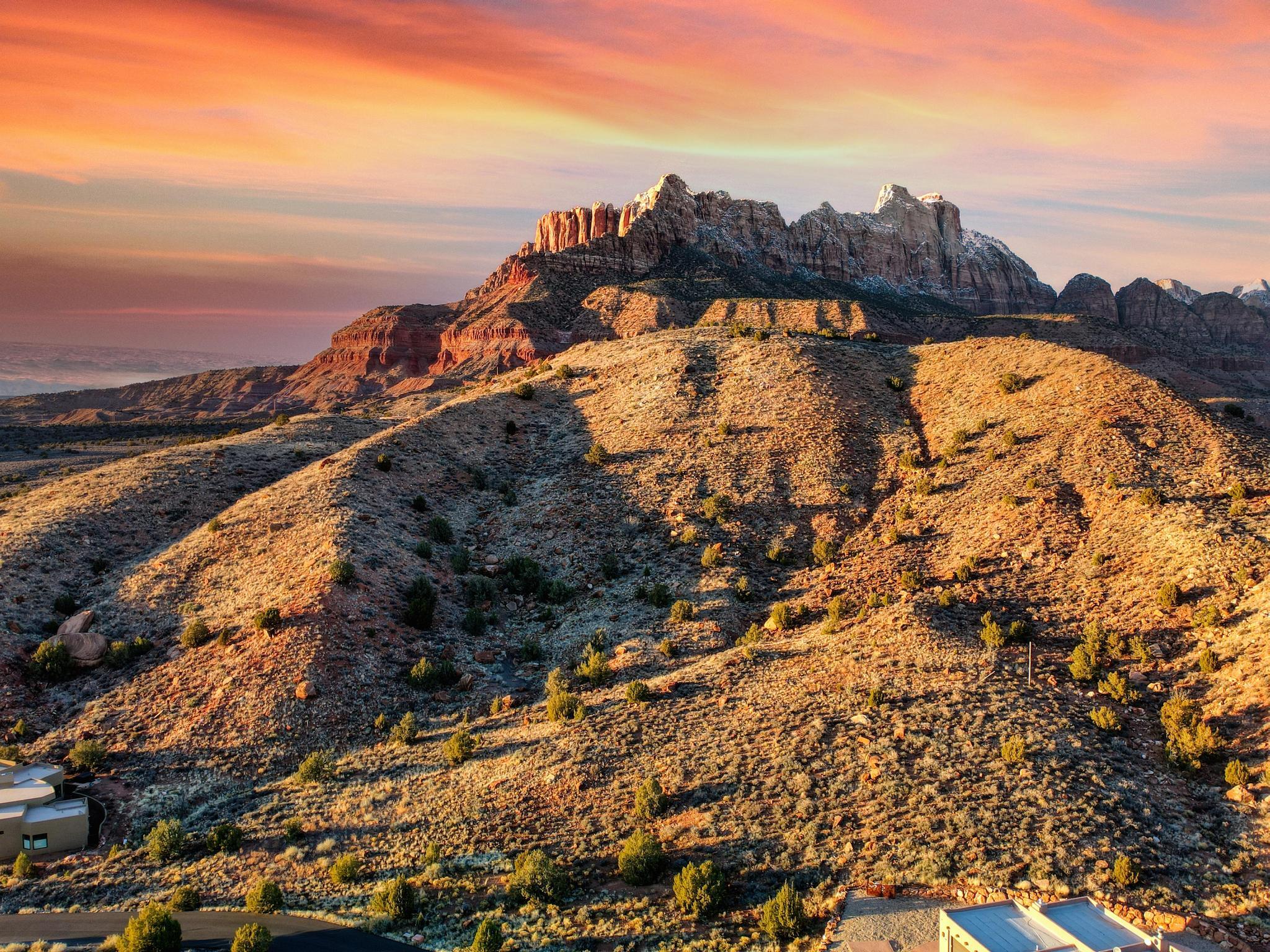 Build Your Dream Above Zion

Opportunities like this are exceptionally rare. Perched atop a scenic hillside in Springdale, Utah, this remarkable homesite offers a front-row seat to some of the most spectacular landscapes in the American Southwest. Just minutes from Zion National Park, this premier lot combines privacy, breathtaking views, and an unmatched connection to nature.

Encompassing approximately 0.33 acres and bordered by protected conservation land, the property lives much larger--offering the feel and privacy of a two-acre estate without the added maintenance or tax burden on the surrounding preserved acreage.

Imagine waking each morning to panoramic views stretching in every direction. From dramatic red rock cliffs and rolling desert vistas to unforgettable sunrises and vibrant sunsets, every window of your future home becomes a living work of art. Elevated above the valley, the setting provides a sense of peace, space, and exclusivity that is increasingly difficult to find.

Whether you're envisioning a luxury primary residence, a vacation retreat, or a legacy property to enjoy for generations, this homesite provides the perfect canvas. Thoughtfully positioned to blend seamlessly with its natural surroundings, it offers the ideal balance of tranquility, adventure, and modern living.

Experience the beauty, privacy, and inspiration that only Springdale can offer. This is more than a place to build a home--it's a chance to create a lifestyle surrounded by some of Utah's most iconic scenery.

Private. Elevated. Unforgettable.