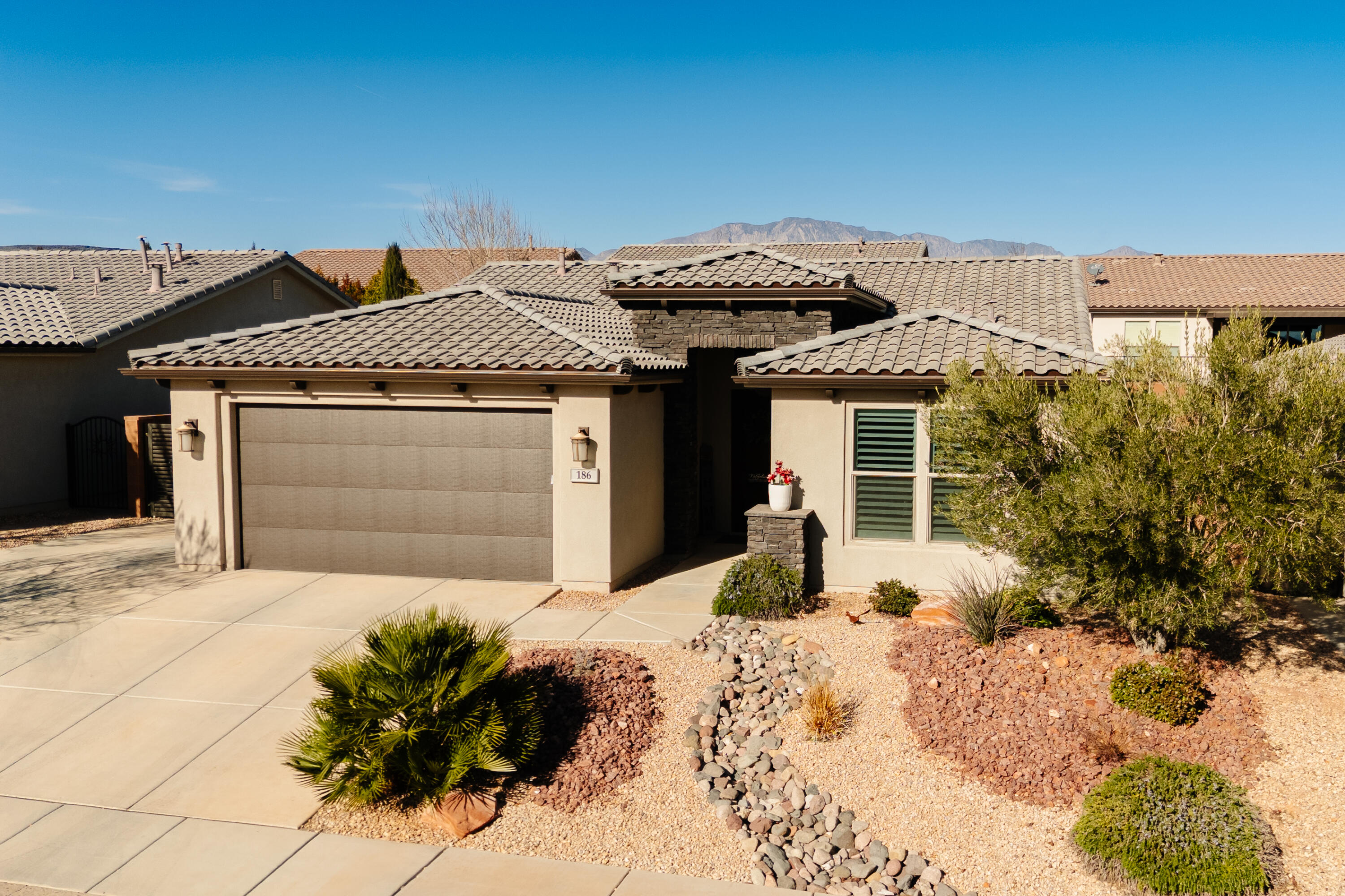 **Welcome to Your Dream Home in the Heart of Washington, Utah!** Discover this beautifully maintained, **single-level family home** in one of Washington's most desirable neighborhoods. Lovingly cared for by *only one owner*, this home shows pride of ownership with **pristine interior condition** throughout. Offering **3 spacious bedrooms** and **2 full bathrooms**, the functional layout is perfect for everyday living and entertaining. Enjoy the seamless flow between living spaces, bright natural light, and quality finishes that make every room feel warm and inviting. Step outside to a **fully landscaped yard**, complete with lush turf - ideal for family fun, relaxation, and low-maintenance living. The generous backyard provides plenty of space for play and outdoor gatherings. This community enhances your lifestyle with fantastic **amenities**, including a **clubhouse**, **pool**, and **pickleball courts** - perfect for socializing and staying active. And with a **low monthly HOA**, you get all of this without high dues. **Don't miss this rare opportunity** to own a pristine, single-level home in the heart of Washington - move-in ready and waiting for you!