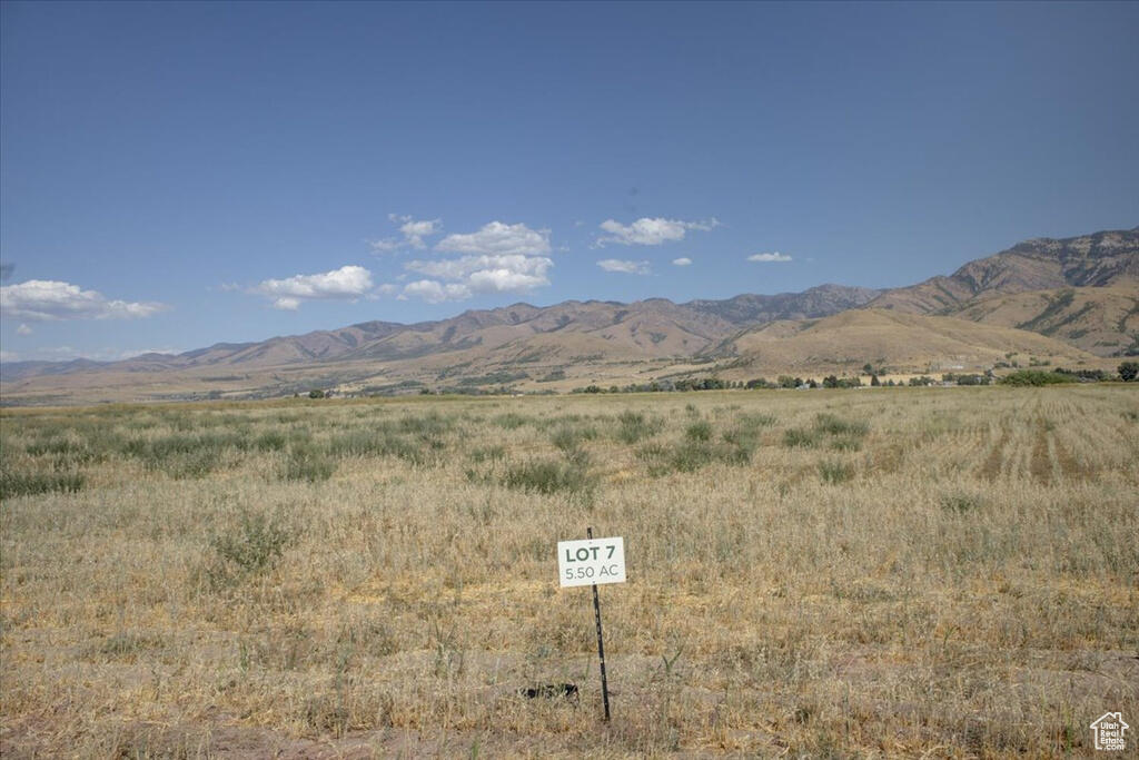 A versatile 5.5 acre lot with agricultural ground, privacy, and mountain views. Whether you are looking for a country estate or hobby farm, this property is a great fit. Convenient access and just 15 minutes from Cherry Peak Ski Resort.