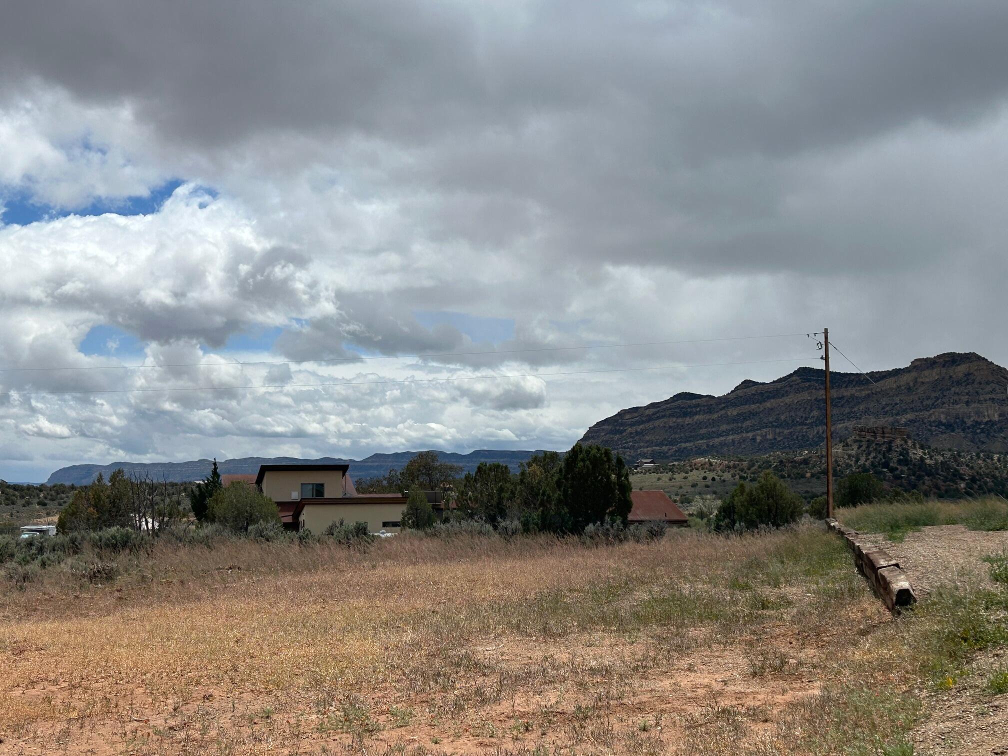 Great 1/2 Acre Building Lot with Beautiful Views of the Escalante Canyons! Located in the Heart of the Grand Staircase Nat'l Monument. Within minutes of trails, canyons, mountains and lakes. Enjoy the scenic beauty, historic sites and wide open spaces. Bring the toys and ride from your lot. Utilities are in the street, water meter can be applied for with Town of Escalante. No HOA, bring your own builder ! Lot size is .46 Acre