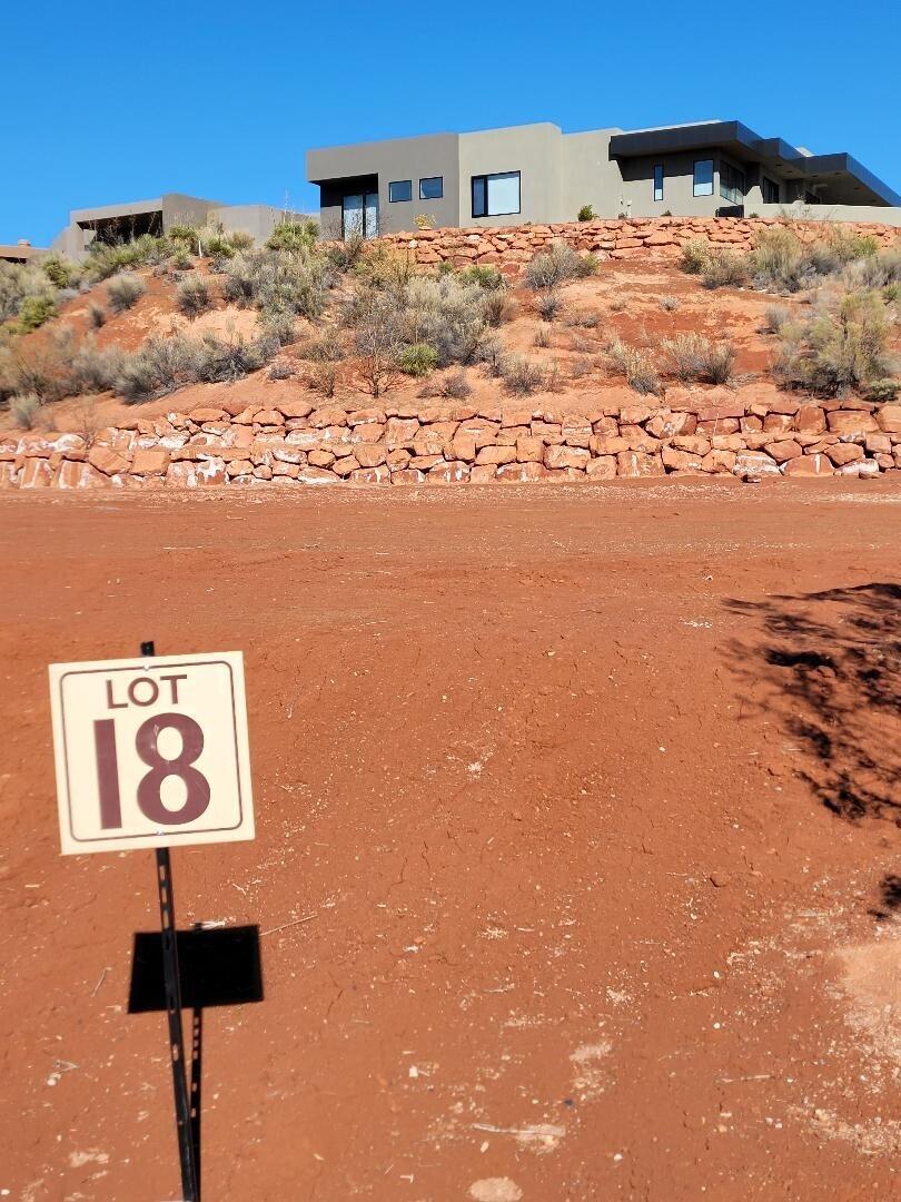 ANASAZI RTIDGE VILLS One of the desirable sites and neighborhoods in the quiet, middle area of Entrada, the private, gated community close to Snow Canyon State Park.  Private, flat site, pad ready, no time frame to build with your Entrada approved builder.  One of 4 contiguous lots in desirable, friendly Anasazi Ridge When completed, Development of only 42 luxury homes. Sale price includes membership to Entrada Country Club.  Pools, tennis, pickleball, hikes, classes, spa etc. Does not include golf membership. Call agent for more info.  Owner/Real Estate Broker in Utah and California.