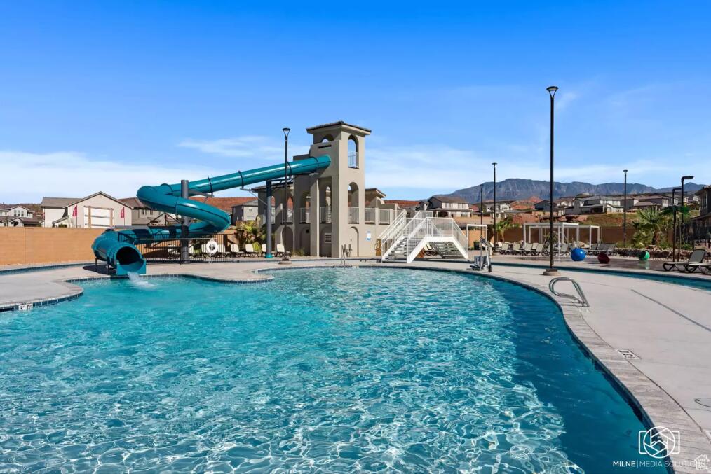Located in Southern Utah's red rock area, this 3-bedroom, 2.5-bath townhome sits in one of the area's few remaining Airbnb-approved communities (believed to be the last zoned for short-term rentals in Washington). It works as a primary home or investment. All furnishings and appliances—valued at over $30,000—are included, making it move-in or rental ready. Community amenities include a large pool, lazy river, three-story waterslide, hot tub, and two pickleball courts. Close to golf courses, hiking and biking trails, and Sand Hollow Reservoir. Whether you're looking for your home, a vacation retreat or an investment Airbnb property, this home has it!