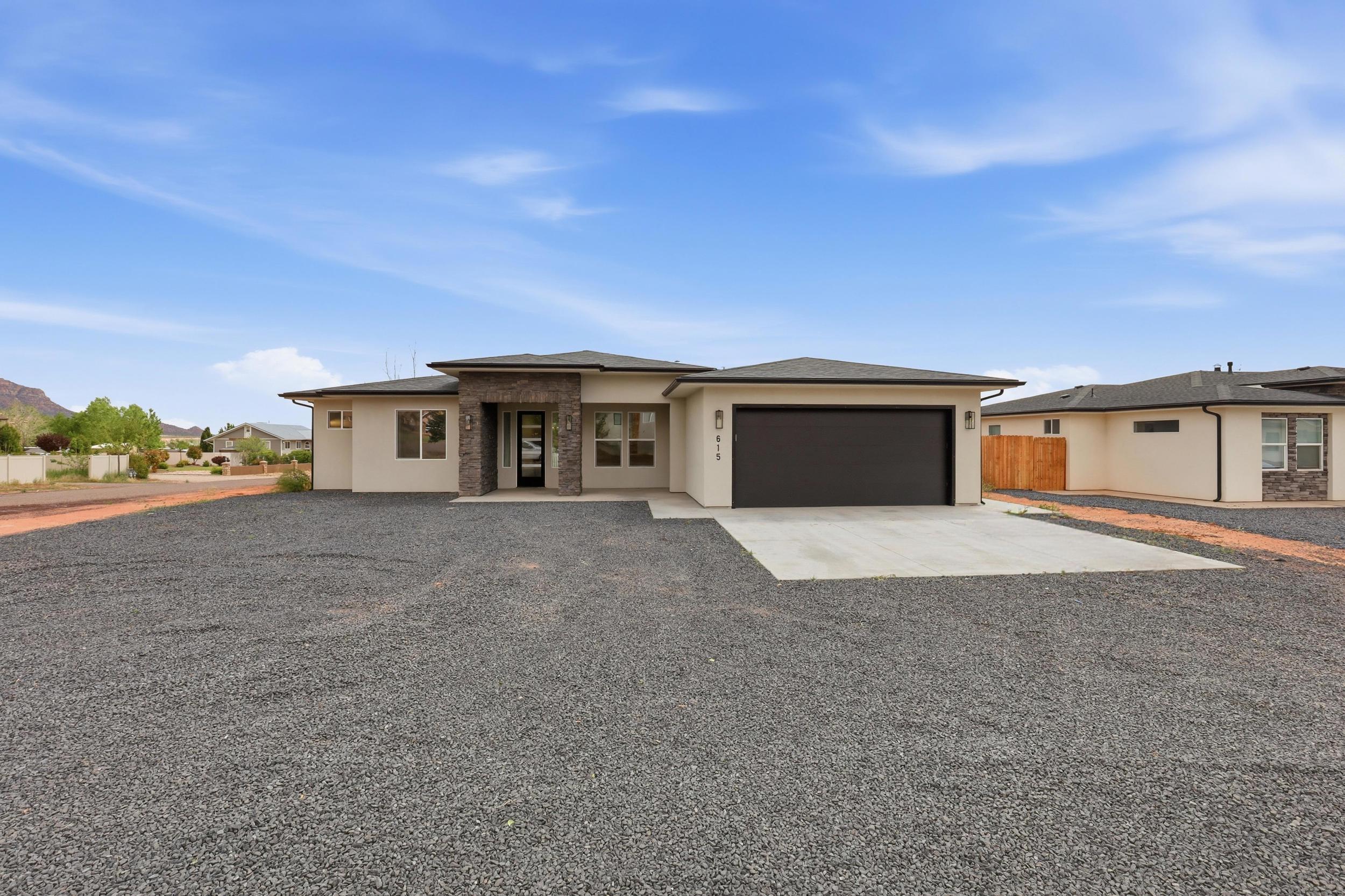 Welcome to this exceptional, newly built home, offering the perfect blend of modern luxury and comfort. It is 4 bedrooms 3 bathrooms, including a Primary bedroom and an additional bedroom with its own bathroom.
The open-concept living area is bright and inviting, with plenty of natural light and easy access to the backyard. The kitchen is well-equipped with modern appliances, plenty of cabinet space thanks to the large island with cabinet storage on both sides.
The primary bedroom features a walk-in closet and dual vanity's. The additional bedrooms are roomy and offer plenty of closet space for your needs. It has a 2 car garage, a front porch with VIEWS, and is located on a .30 acre corner lot that faces the stunning red mountains.  Seller is motivated and this property is priced under appraisal value giving you instant equity! Ask about our preferred lender incentives to see how you can make this amazing home your own!