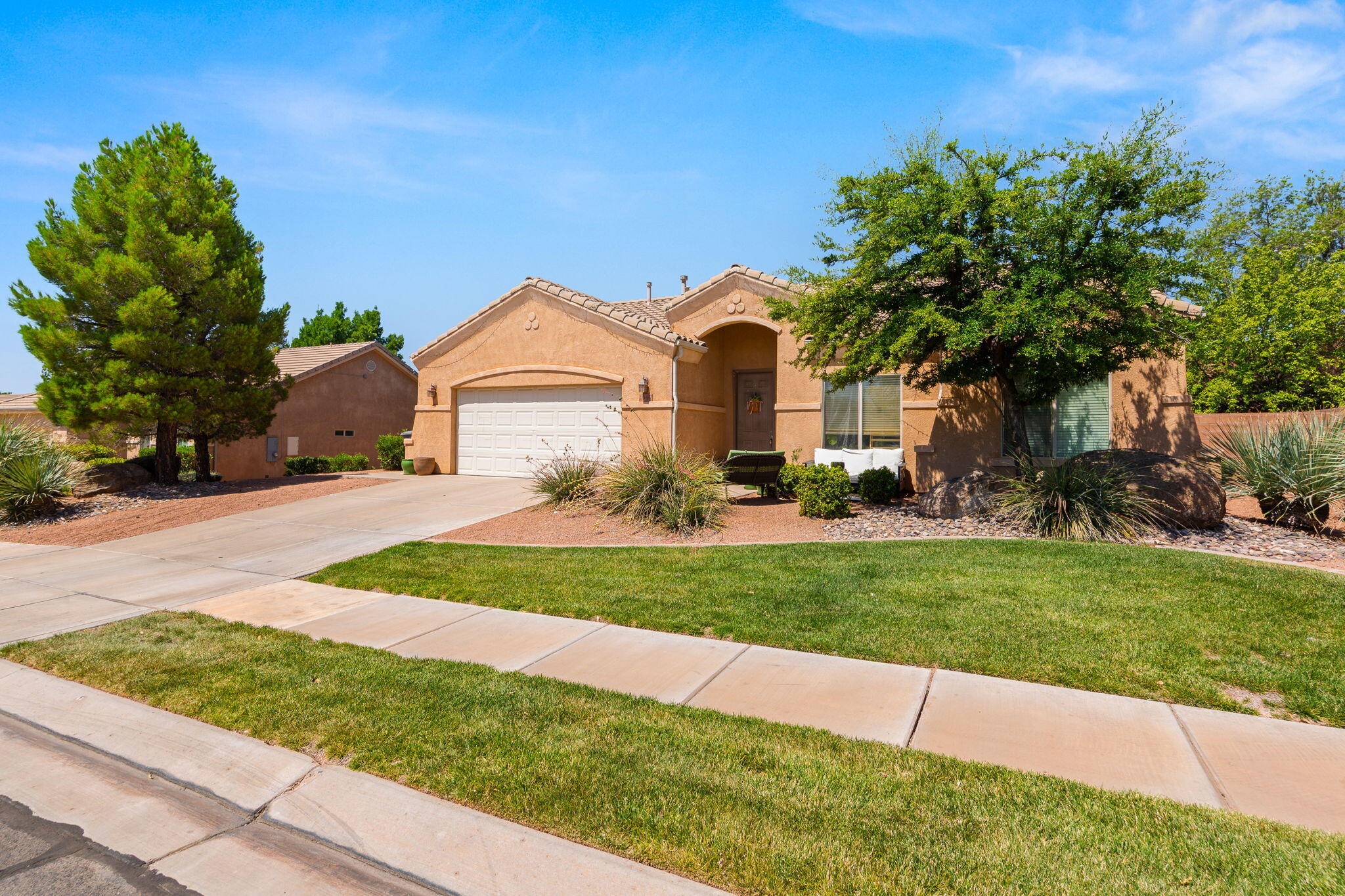 Great home located in Stone Gate at Seven Hills.  Home has an open floor plan with master on one side and other bedrooms on the other.  Tile floors and open living room and kitchen/dining concept.  Home has a nice private backyard with a generous covered patio.  Home is located close to Snow Canyon State Park, bike and walking trails as well as schools, parks and shopping centers.
